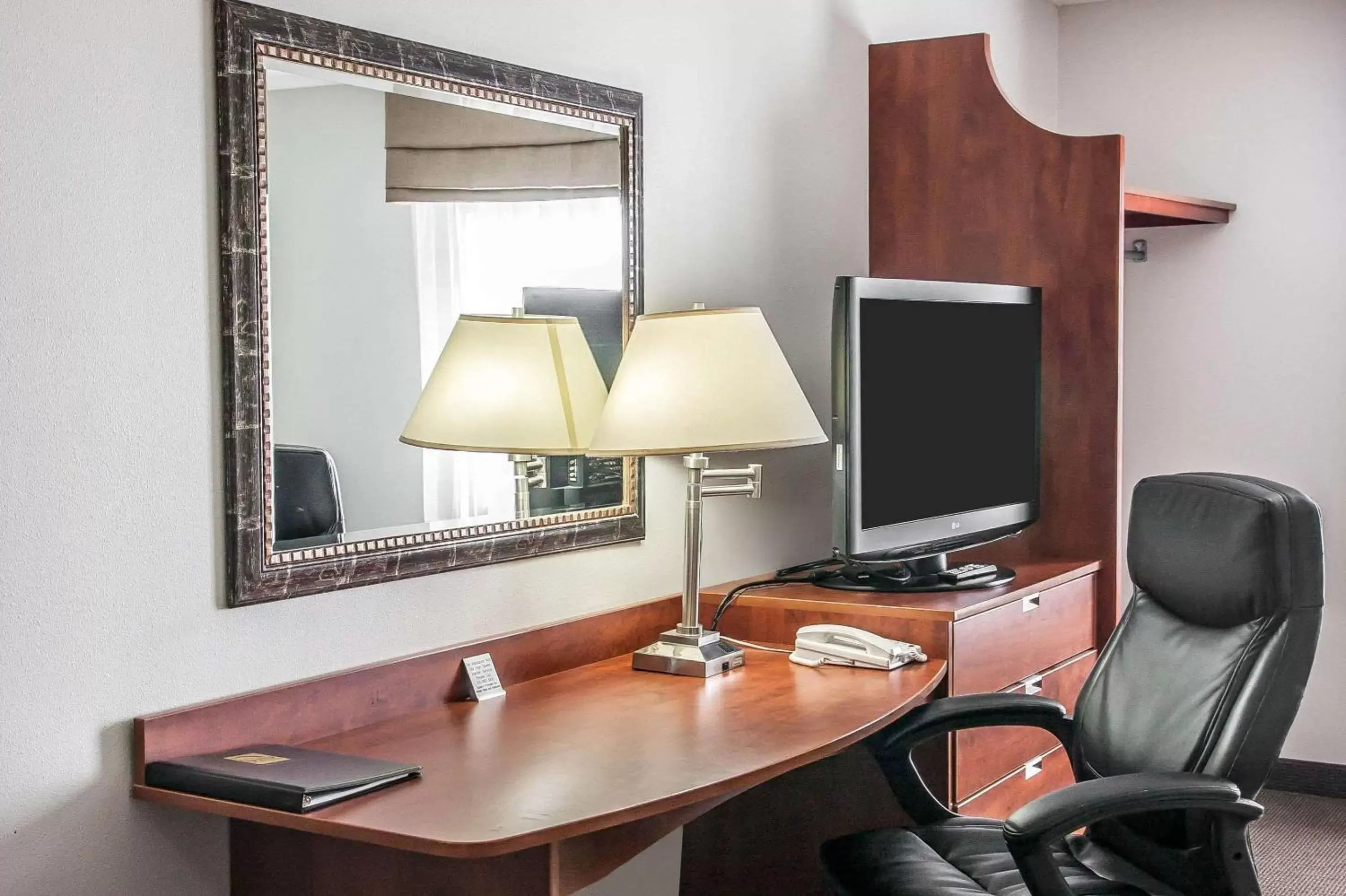 Photo of the whole room, TV/Entertainment Center in Sleep Inn & Suites Conference Center and Water Park