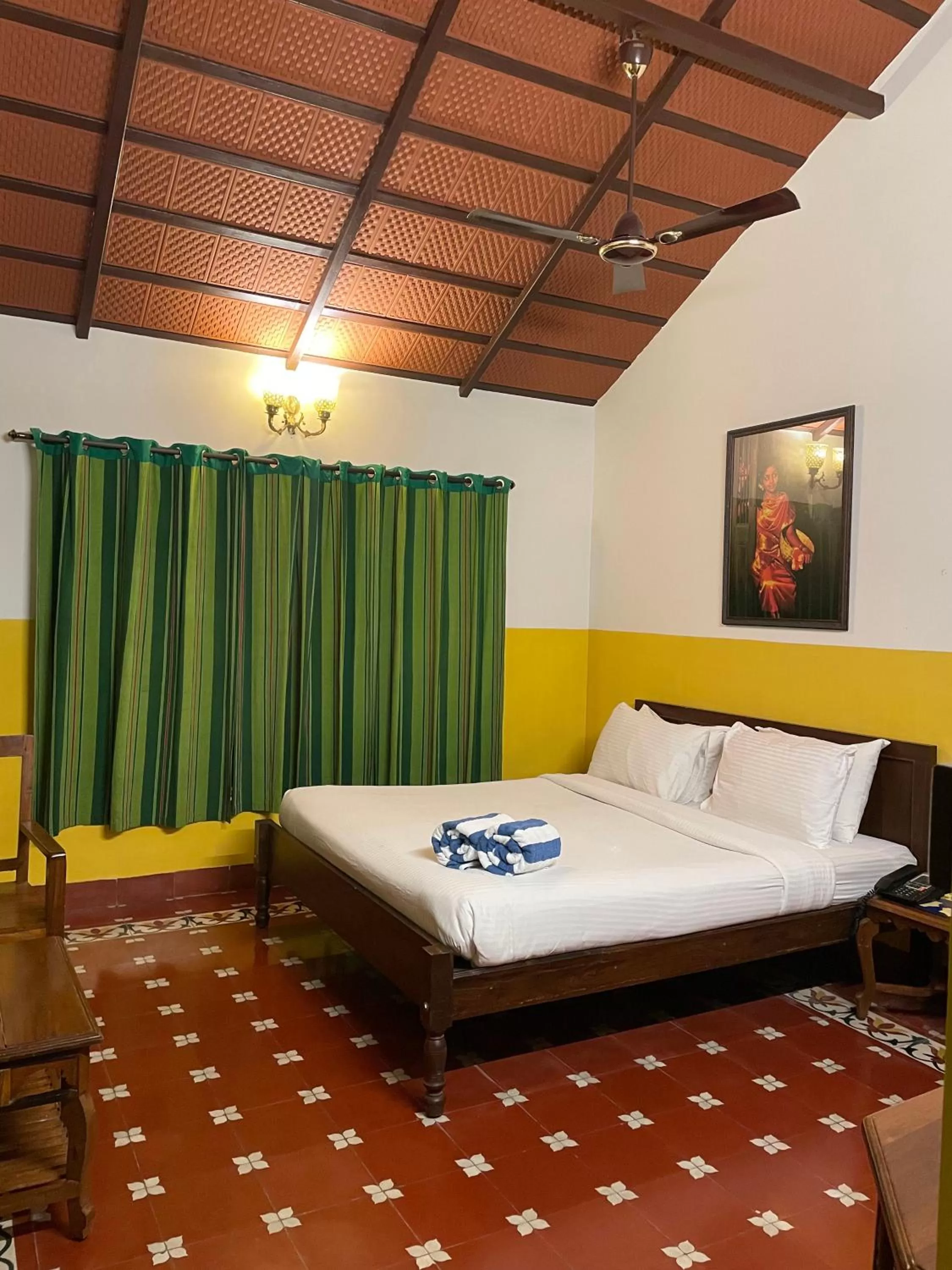 Bed in Marutham Village Resort