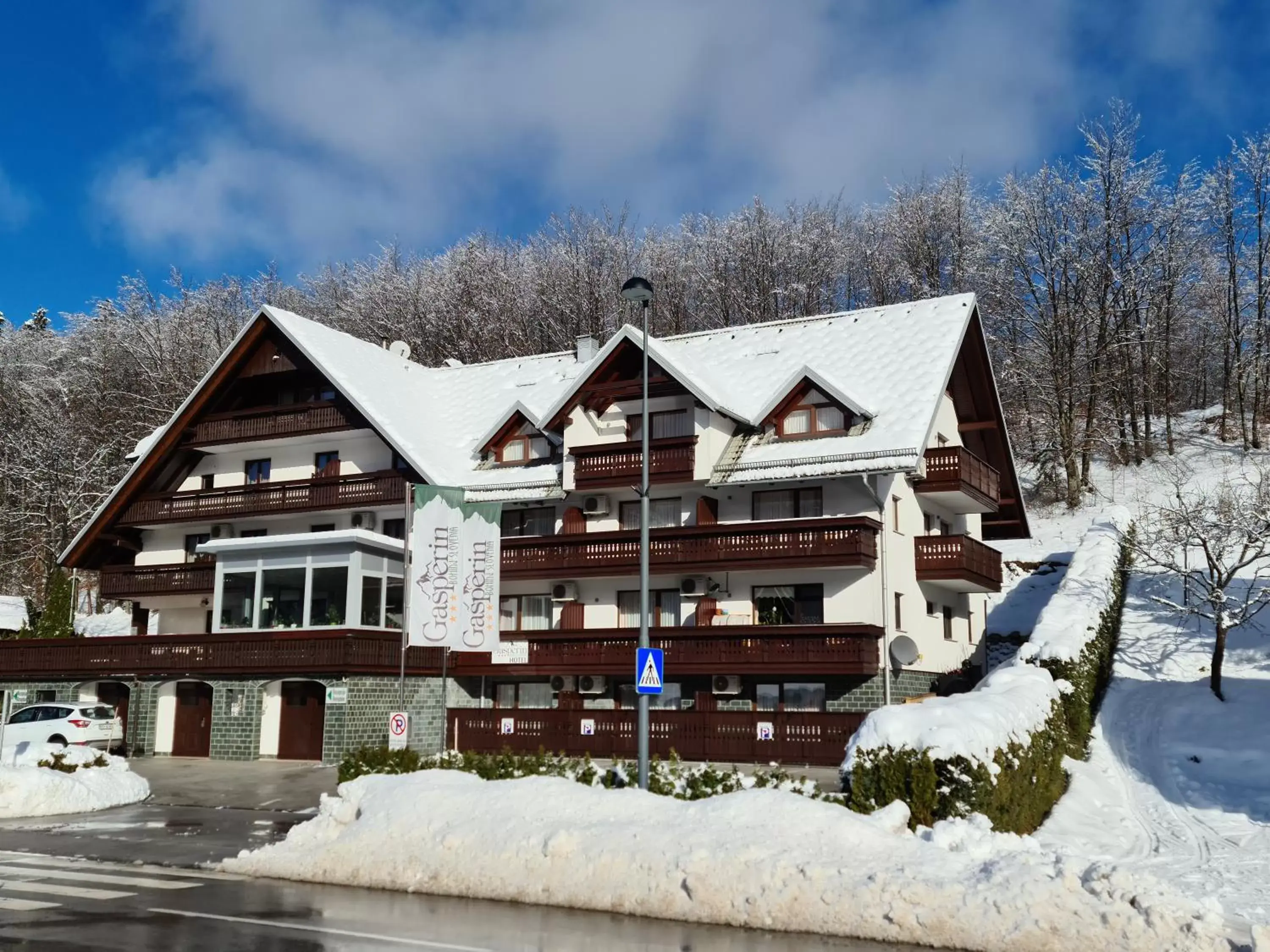 Property building, Winter in Hotel Gasperin Bohinj