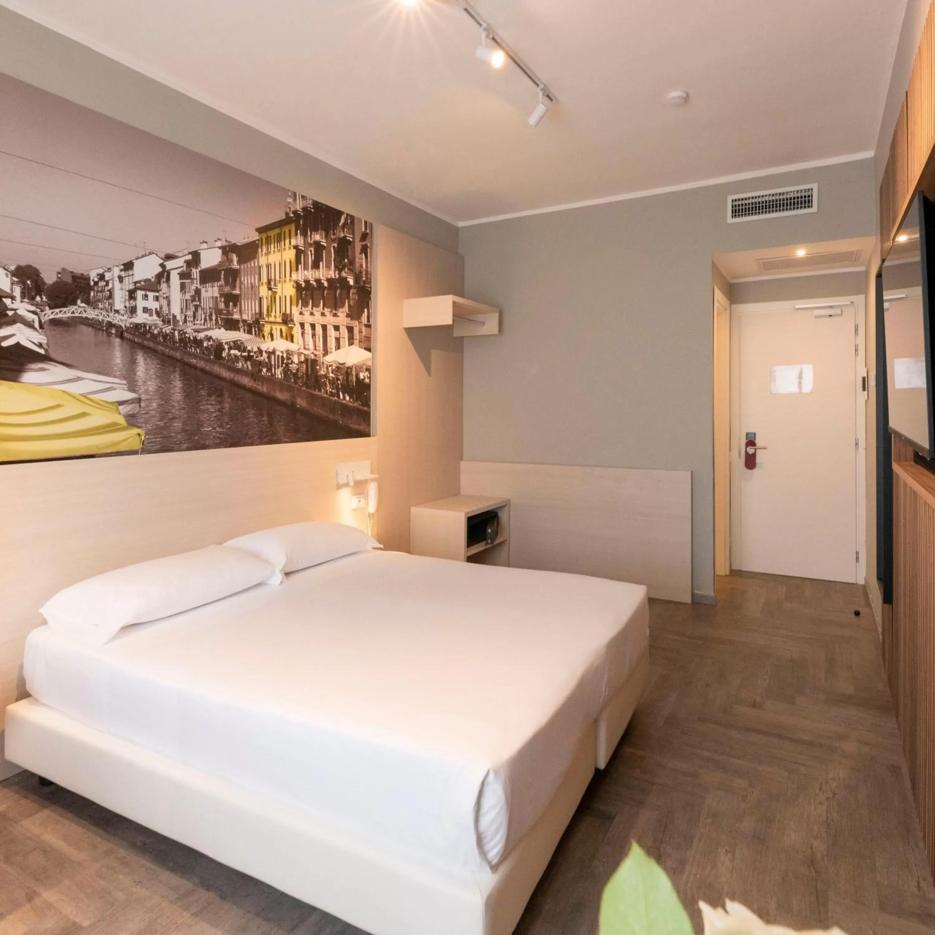 Bed in Kleos Hotel Milano