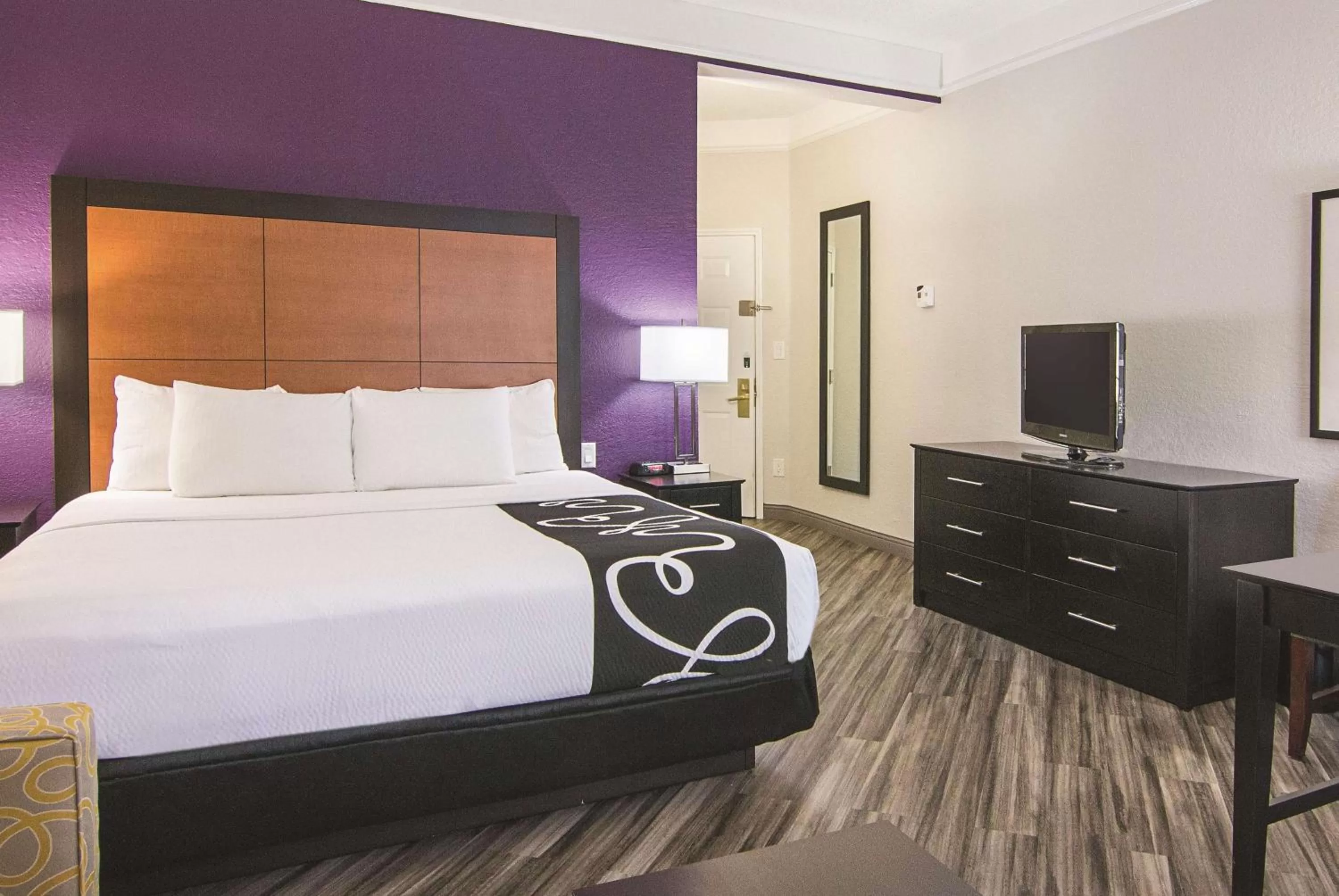 Photo of the whole room, Bed in La Quinta by Wyndham Orlando Airport North - Free Airport Shuttle!