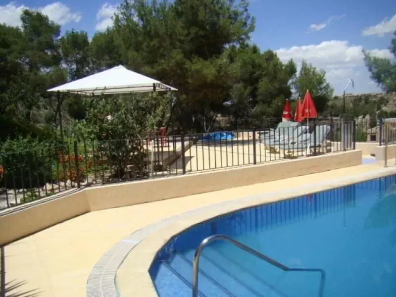 Property building, Swimming Pool in Hotel La Mariposa