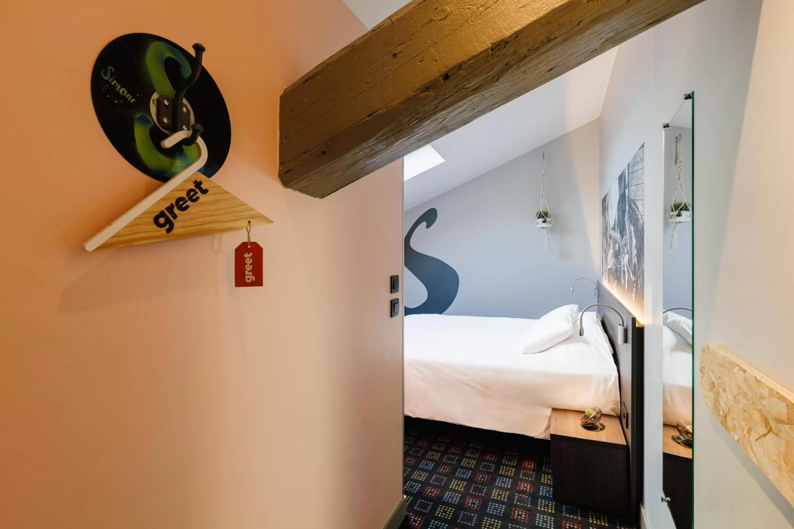 Decorative detail, Bed in Greet Hotel Lyon Confluence