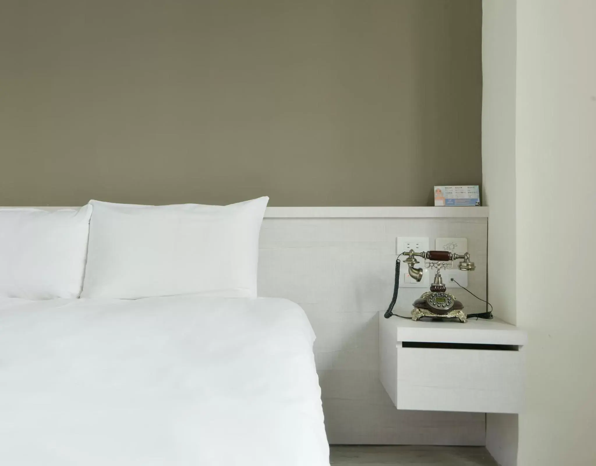 Bed in Raise Hotel Taichung