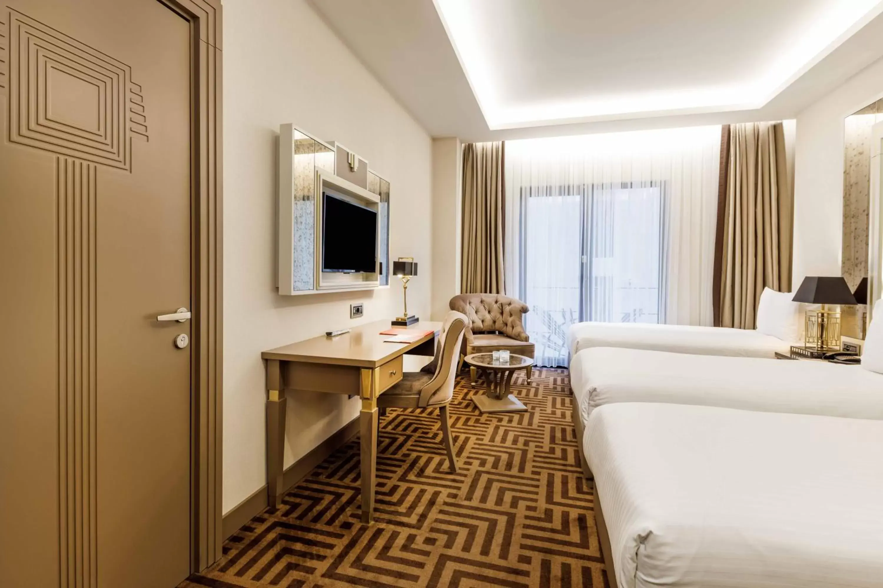 Photo of the whole room, TV/Entertainment Center in Ramada by Wyndham Istanbul Golden Horn