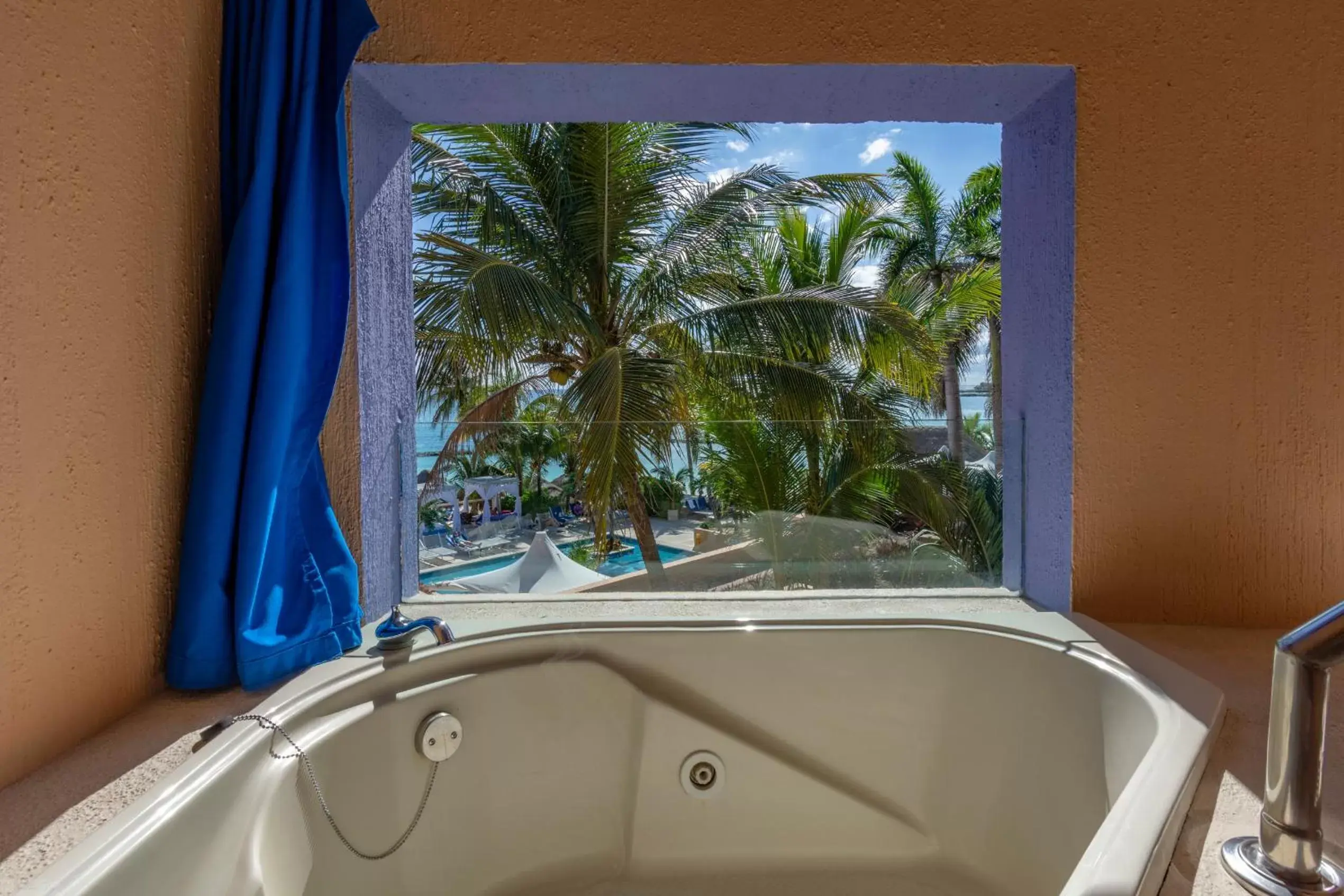 Bedroom in Puerto Aventuras Hotel & Beach Club