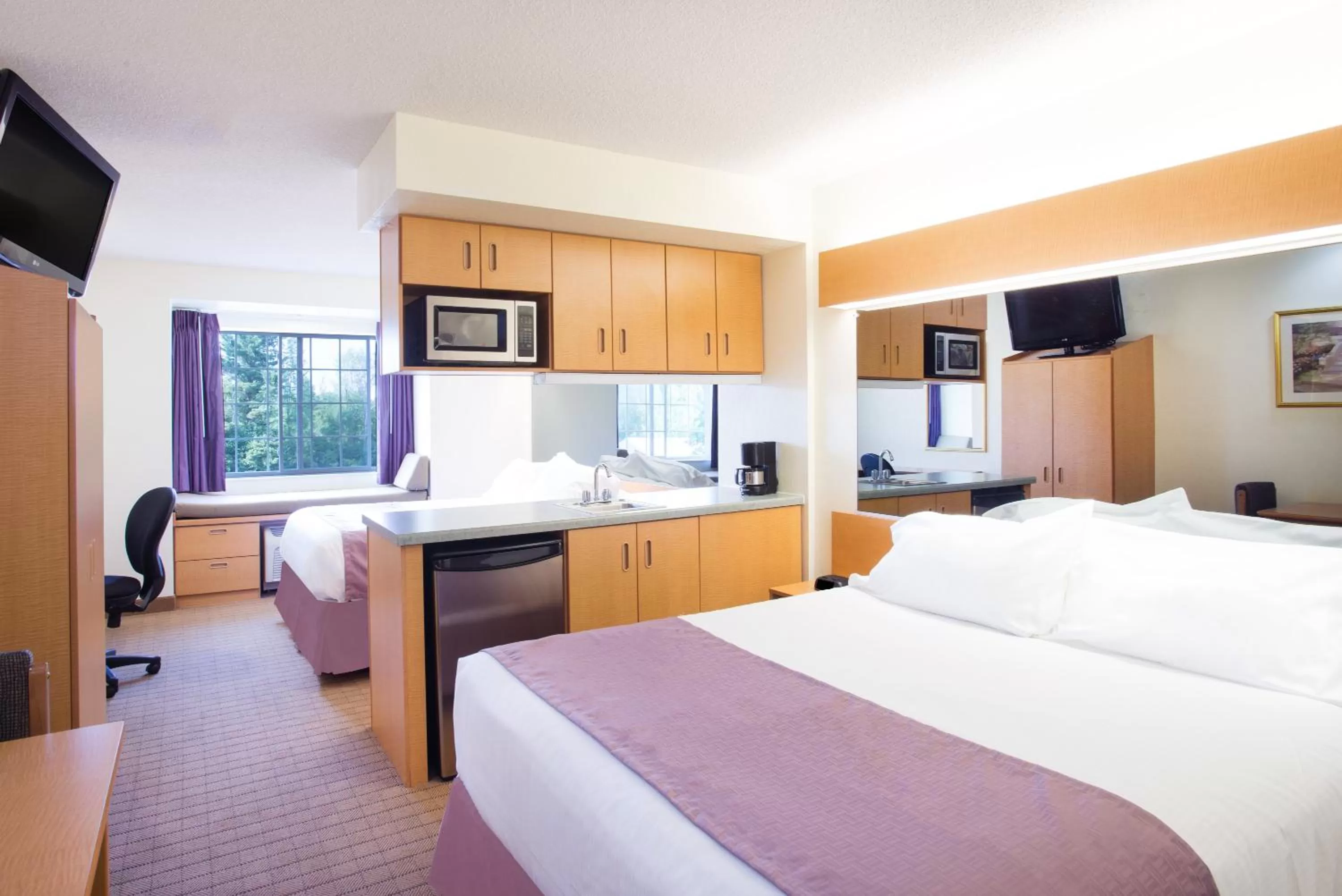 Photo of the whole room, Bed in Microtel Inn & Suites by Wyndham Plattsburgh