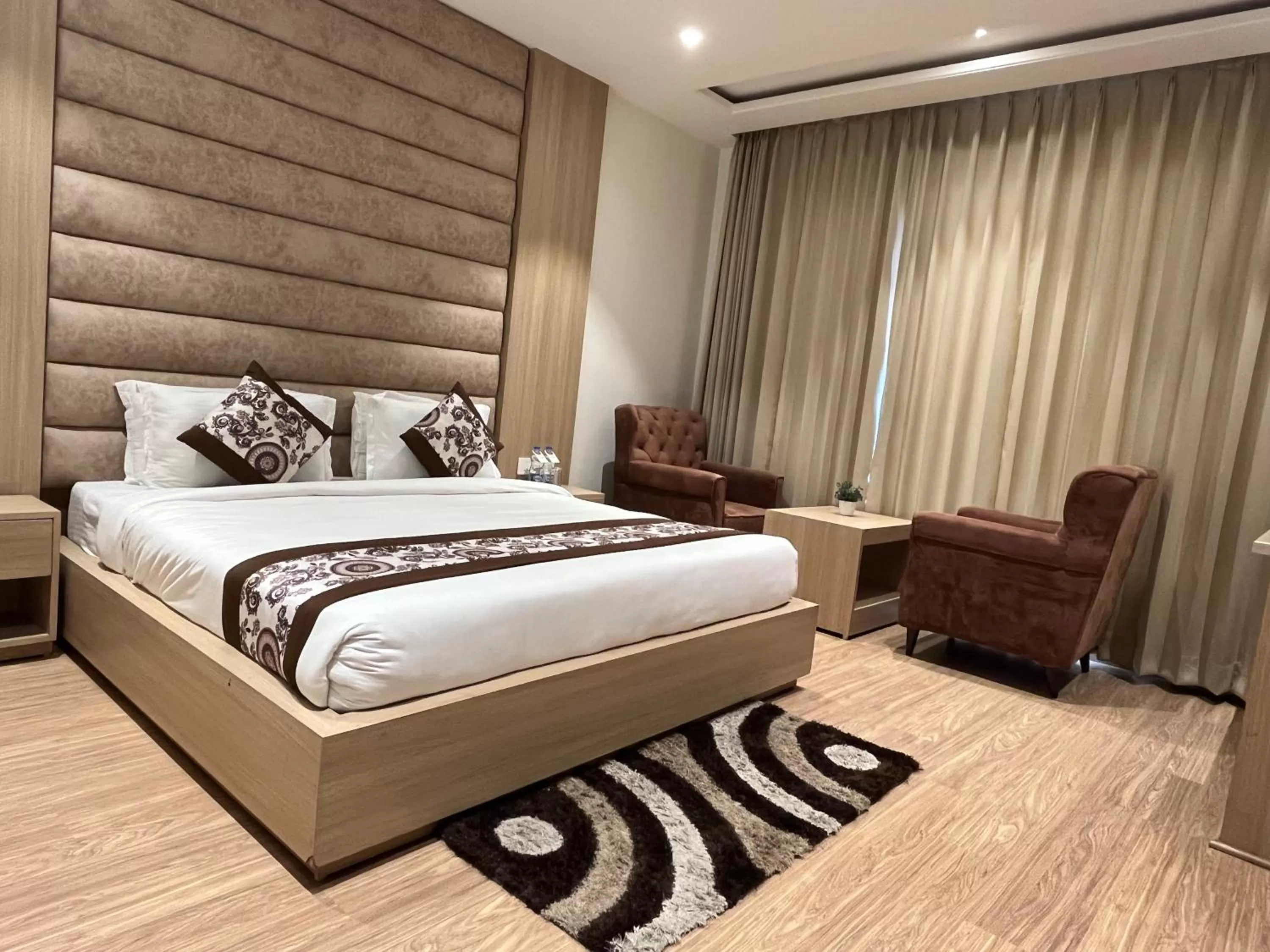 Photo of the whole room, Bed in RRV Hotel