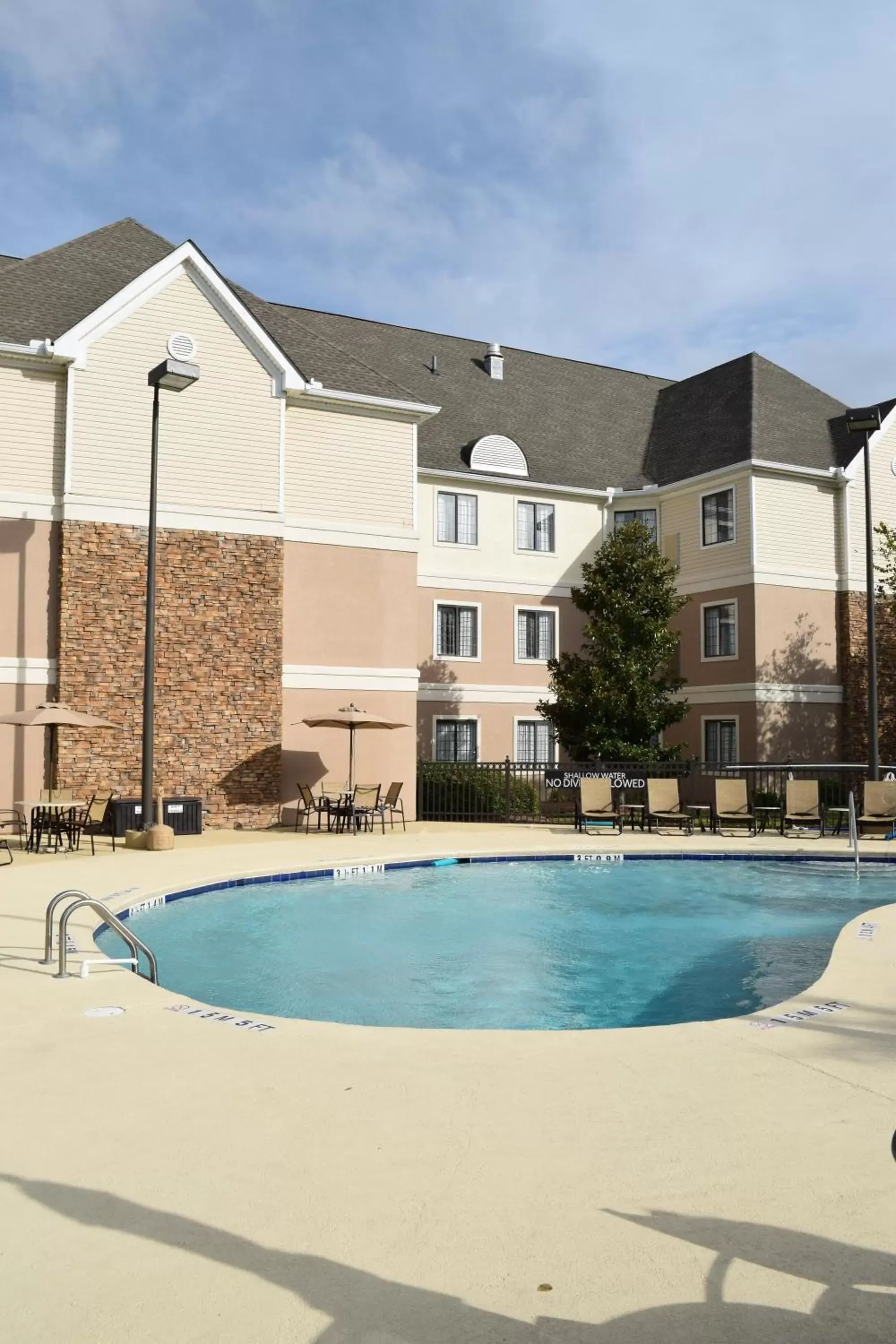 Swimming pool, Property Building in Staybridge Suites Myrtle Beach-Fantasy Harbour, an IHG Hotel
