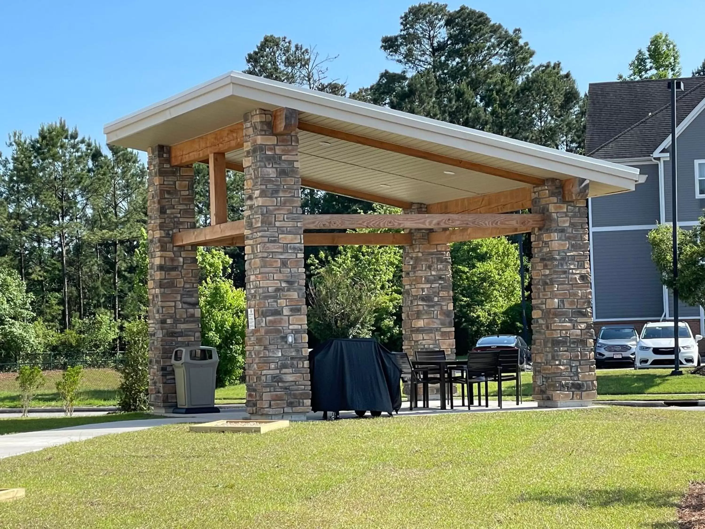 BBQ facilities, Property Building in My Place Hotel-Jacksonville-Camp Lejune, NC