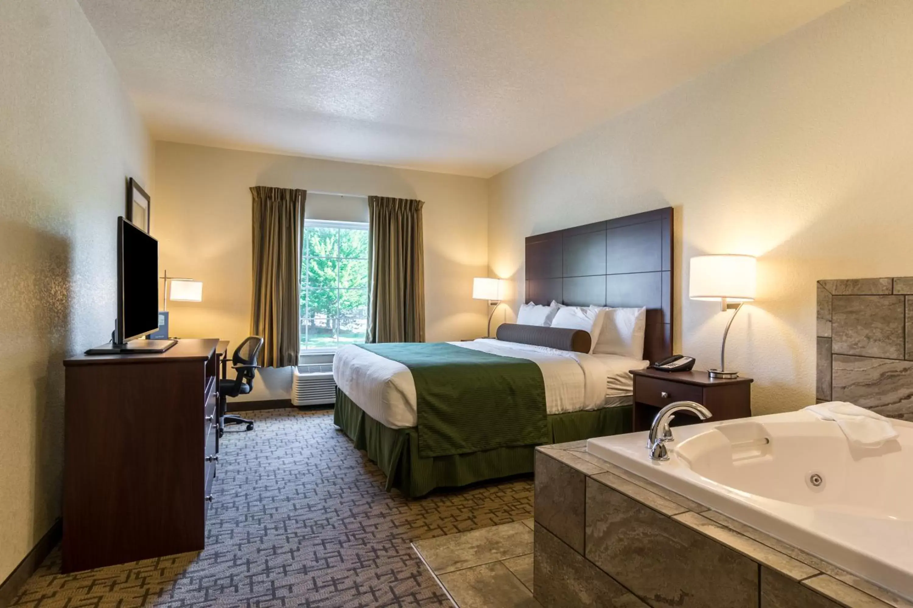 Photo of the whole room, Bed in Cobblestone Hotel & Suites - Erie Photo of the whole room, Bed in Cobblestone Hotel & Suites - Erie