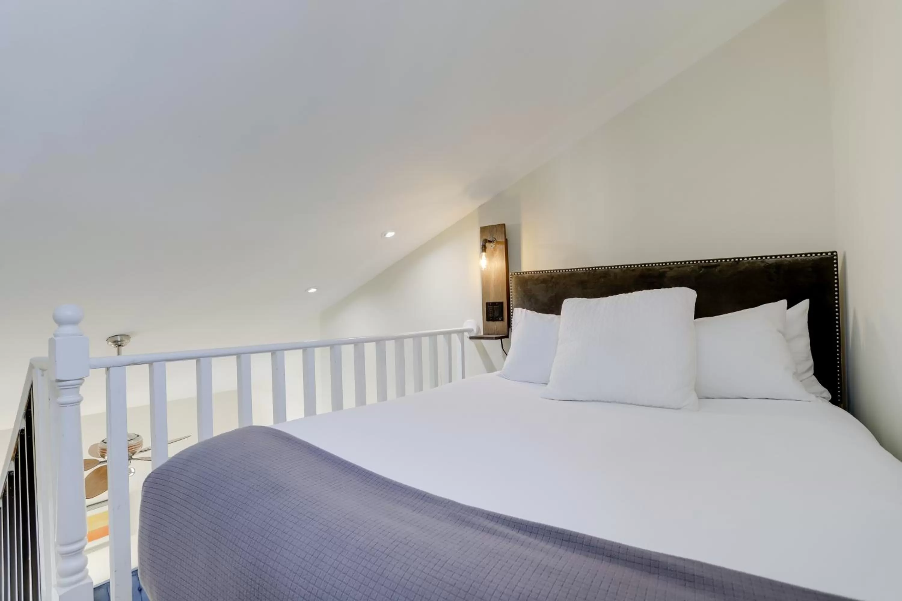 Bed in Sojourn at DuPont Place