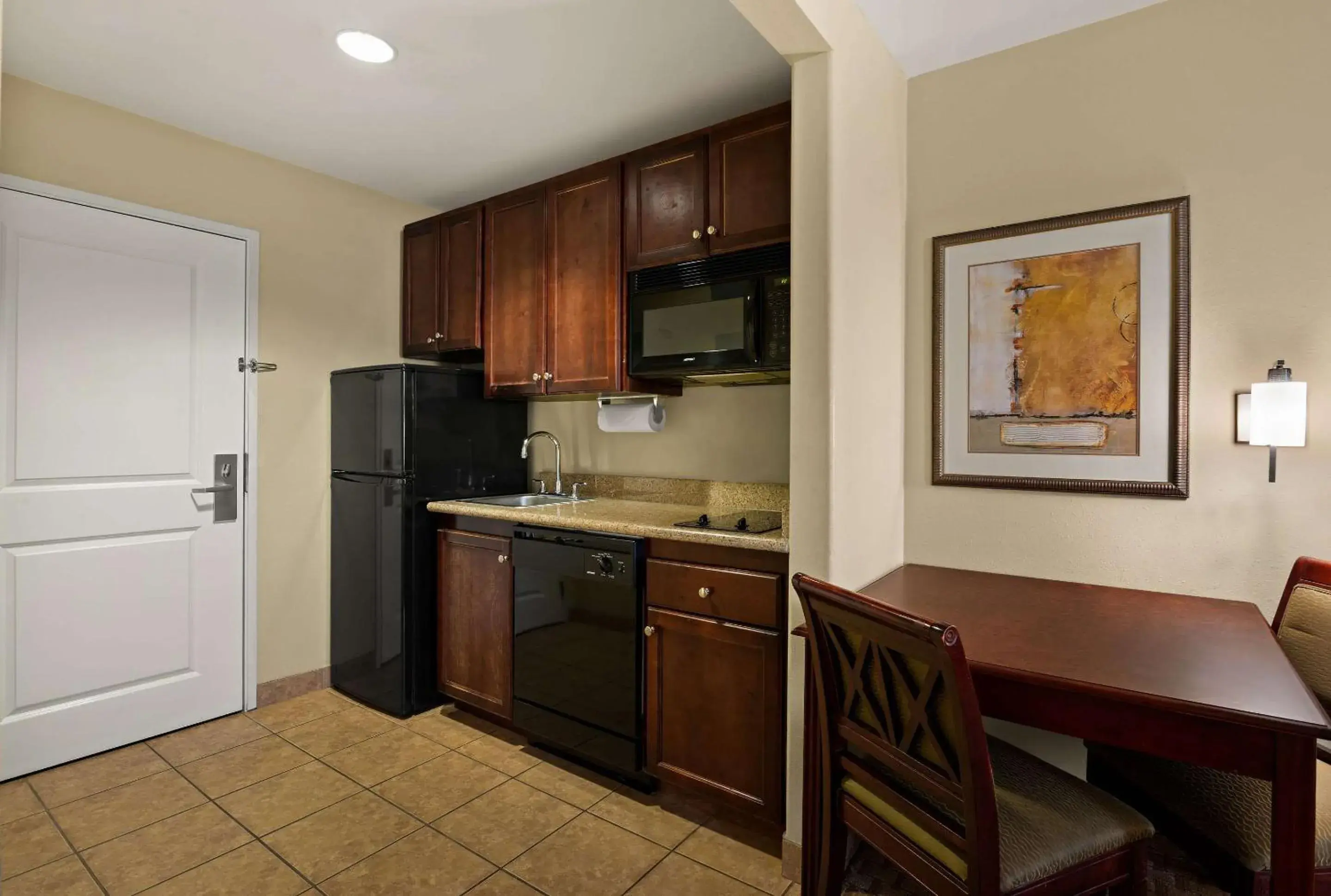 Bedroom, Kitchen/Kitchenette in Mainstay Suites Houma