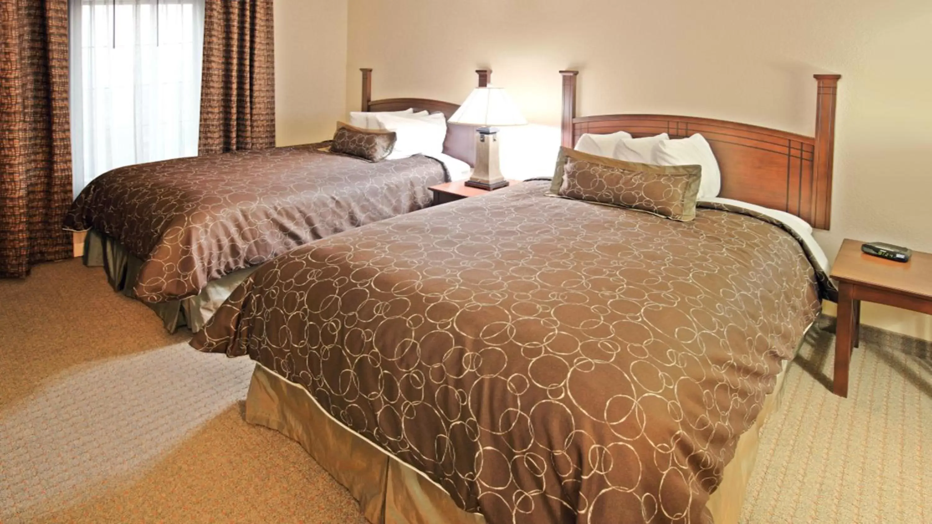 Photo of the whole room, Bed in Staybridge Suites Hot Springs, an IHG Hotel