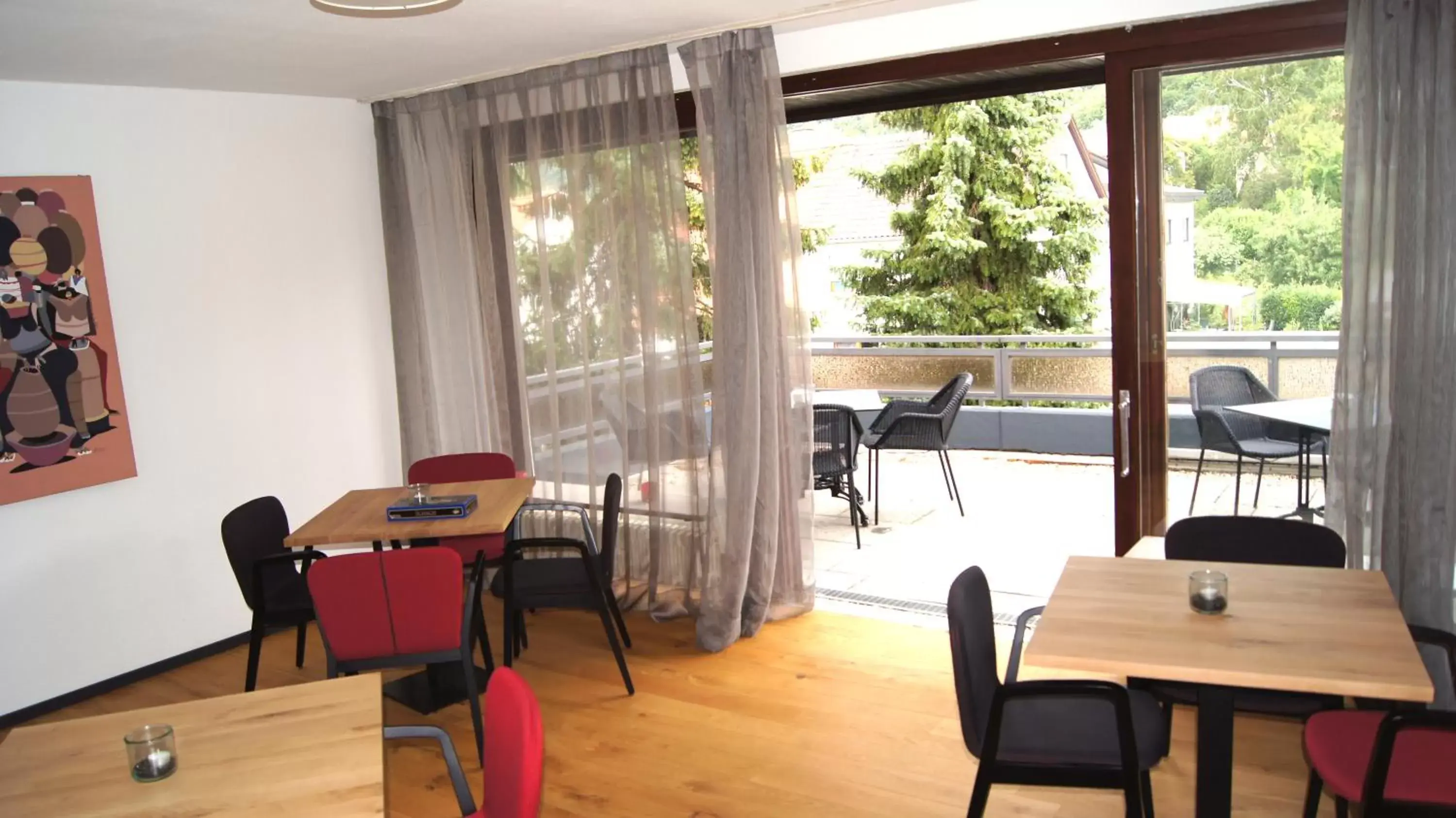 Communal lounge/ TV room, Dining Area in Hotel Restaurant Felderbock