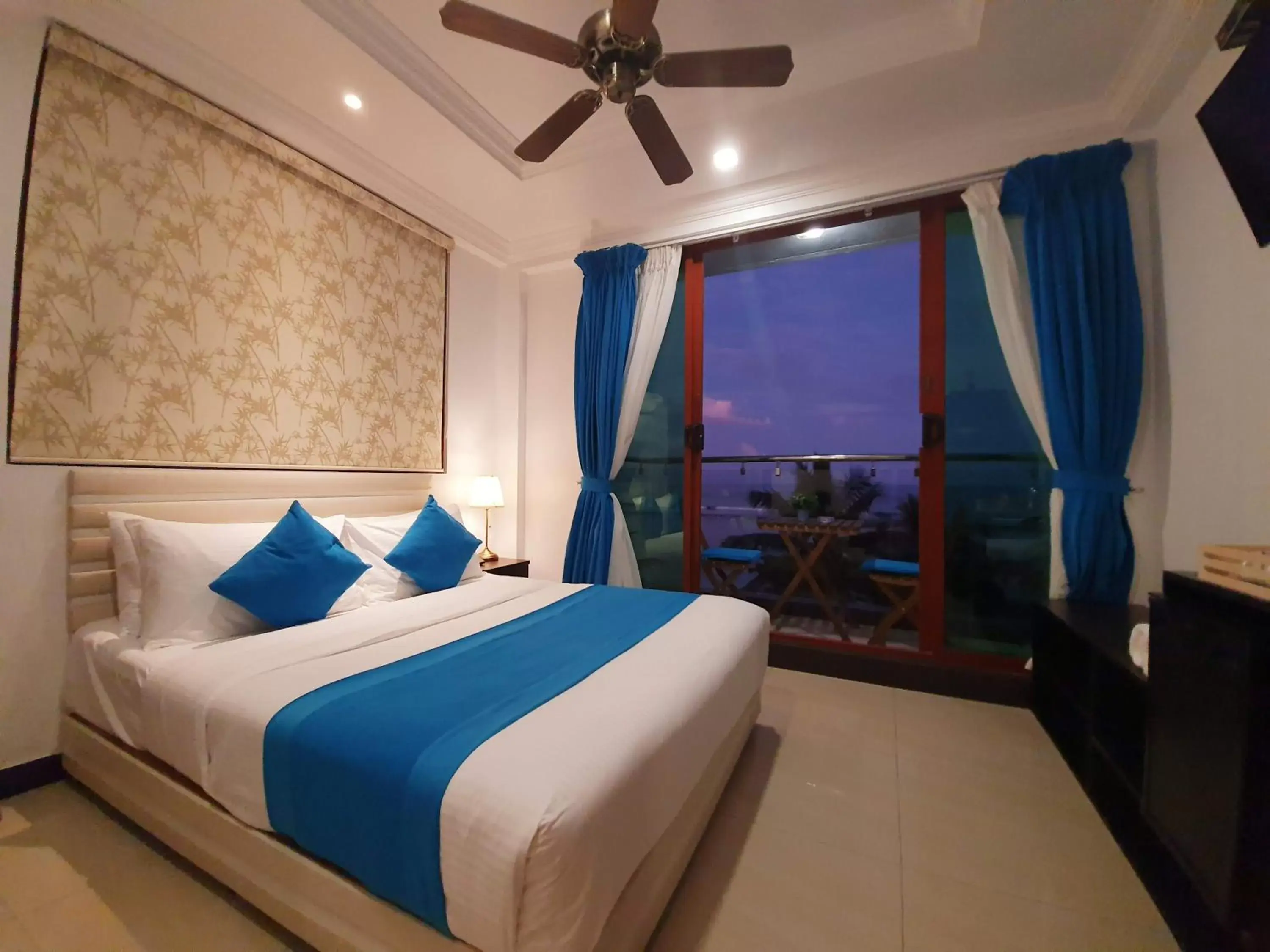 Photo of the whole room, Bed in Huvan Beach Hotel at Hulhumale