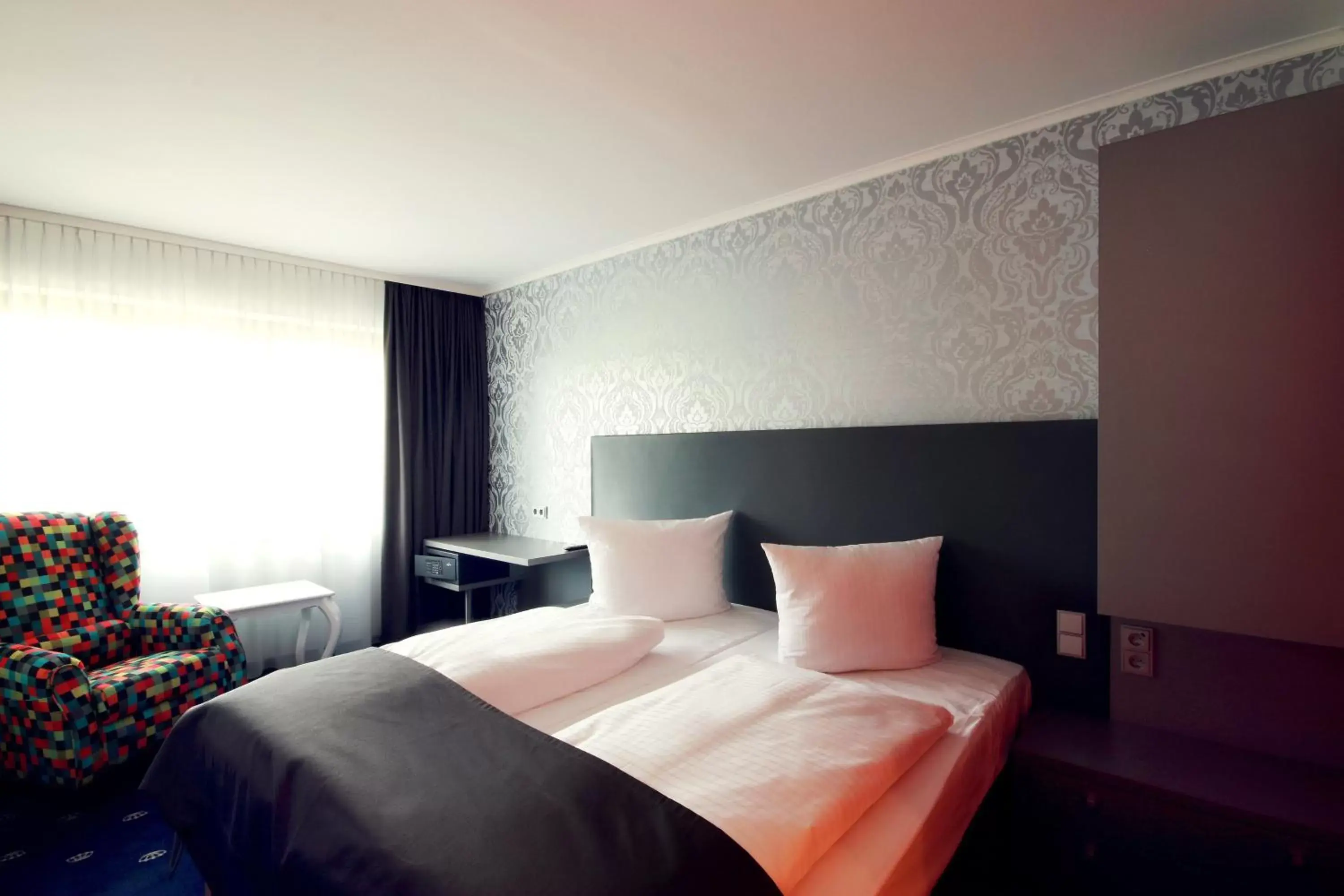 Photo of the whole room, Bed in Holiday Inn Dresden - City South, an IHG Hotel