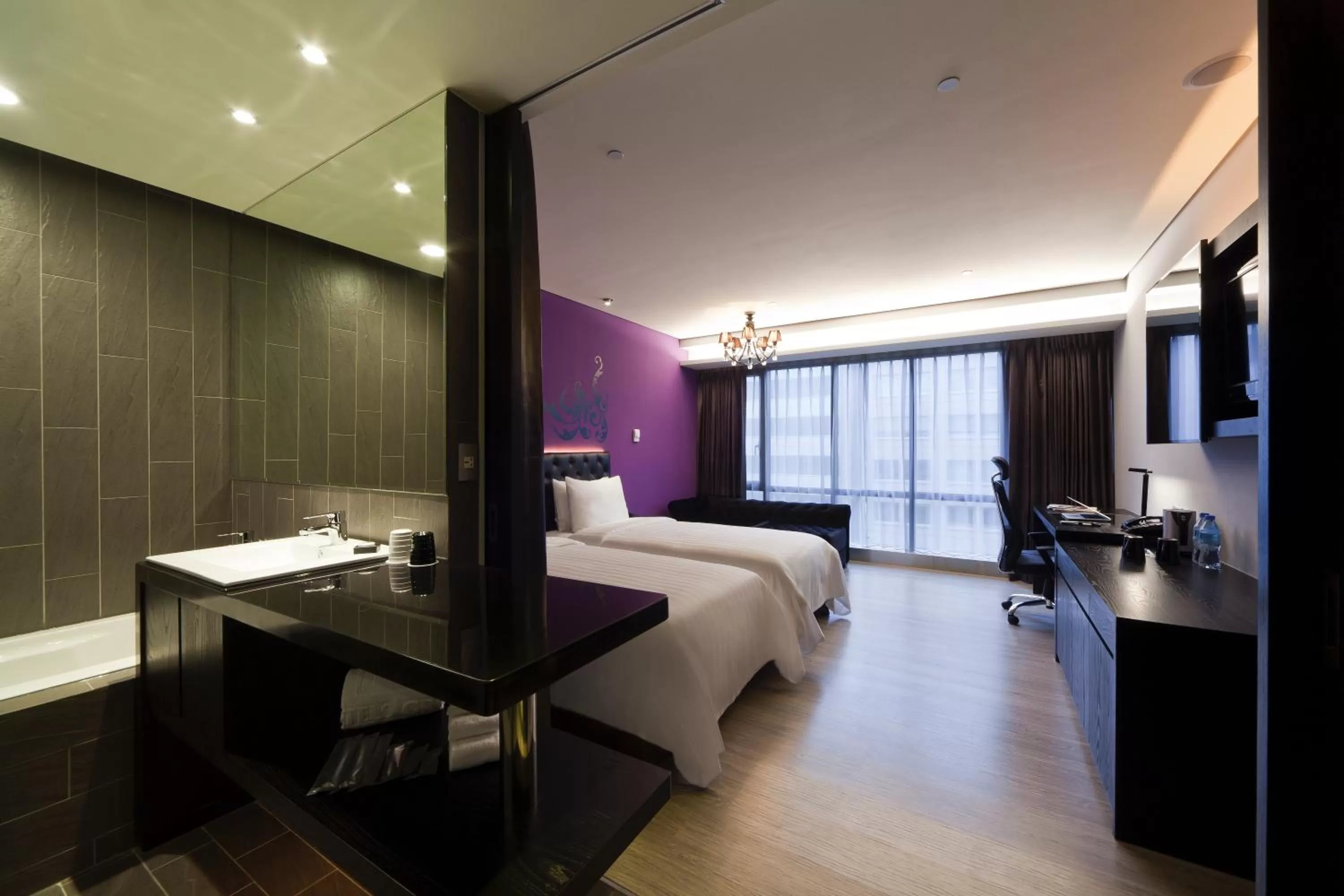 Photo of the whole room, Bed in FX Hotel Taipei Nanjing East Road Branch