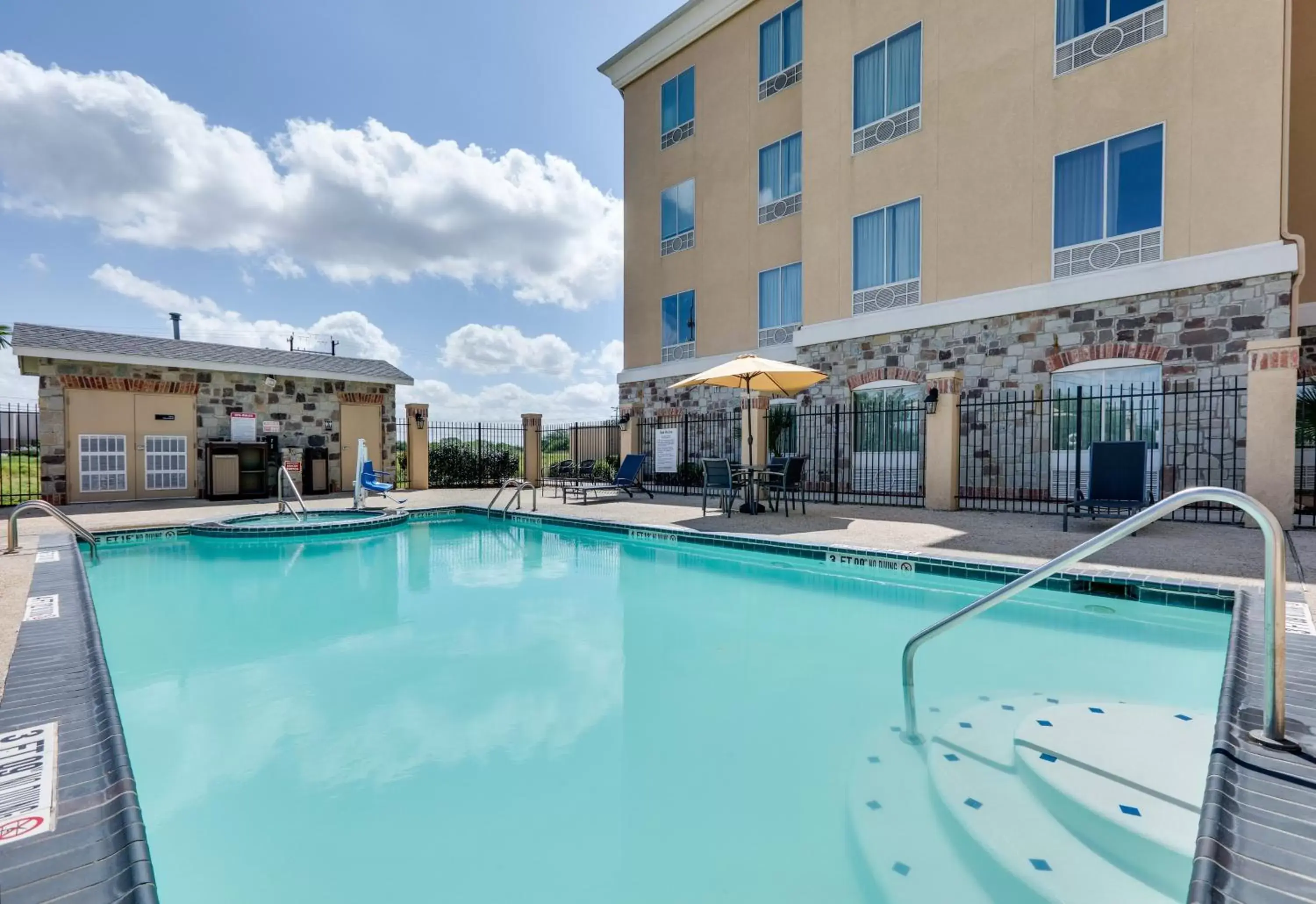 Swimming Pool in Holiday Inn Express & Suites San Antonio Brooks City Base, an IHG Hotel