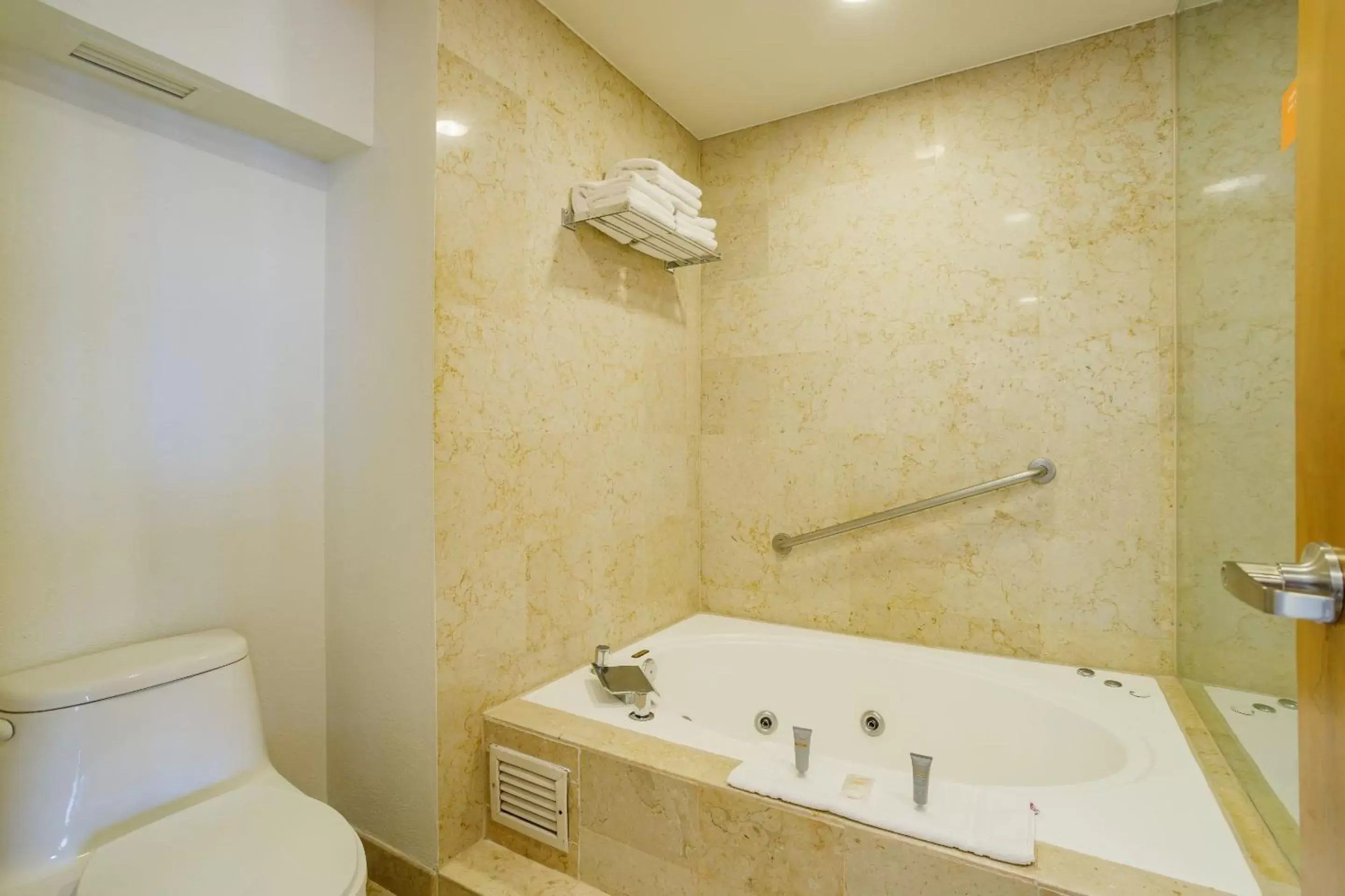 Photo of the whole room, Bathroom in Real Inn Torreon