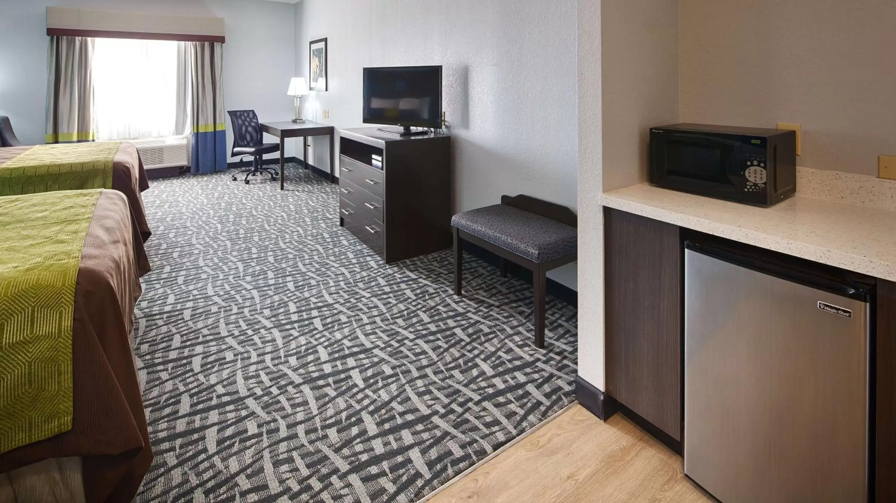 Photo of the whole room, TV/Entertainment Center in Best Western Plus Lonestar Inn & Suites