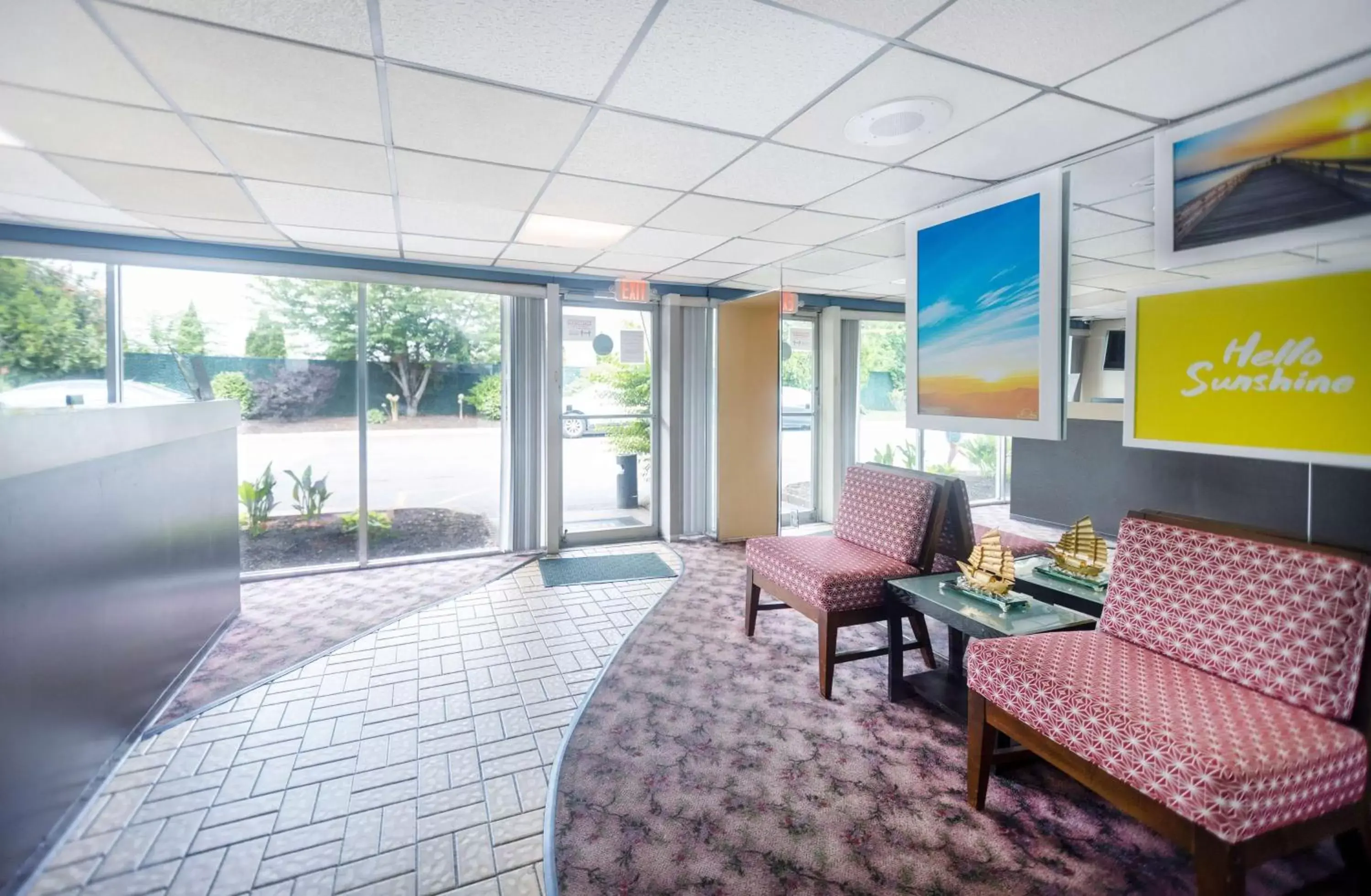 Lobby or reception in Days Inn by Wyndham Hicksville Long Island