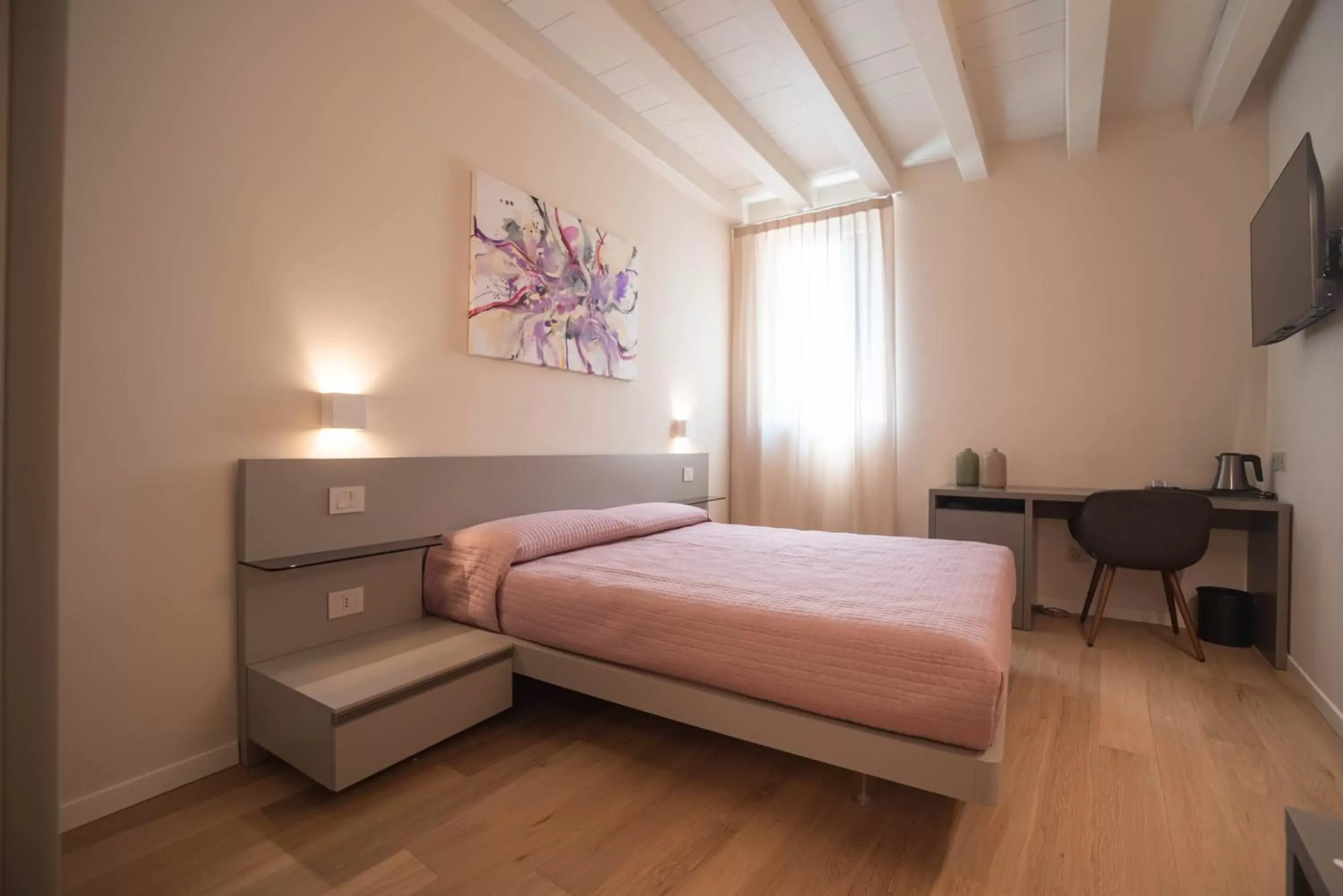 Bed in Maison Calcirelli rooms
