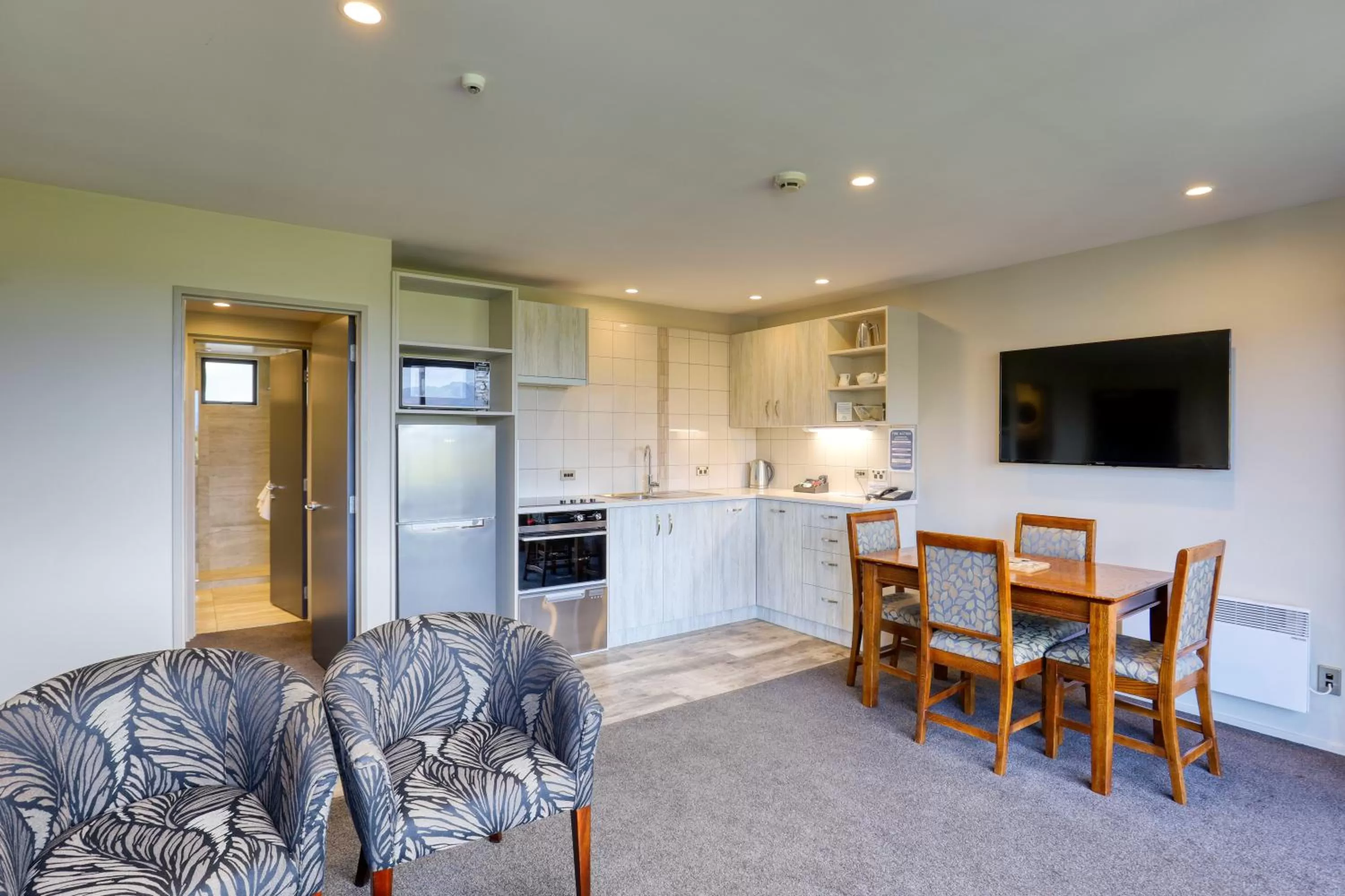 kitchen in Garden Court Suites & Apartments