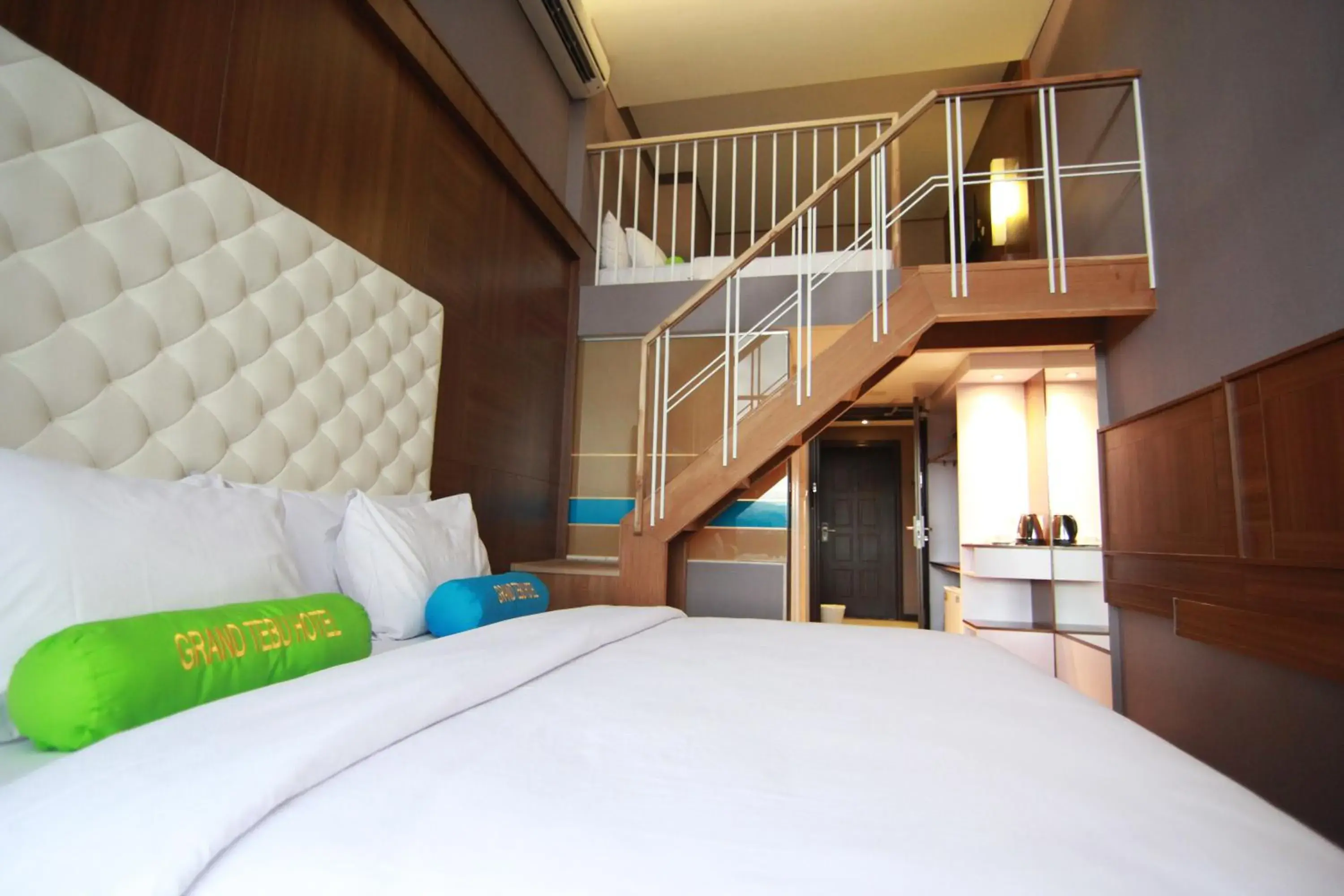 Bed in Grand Tebu Hotel