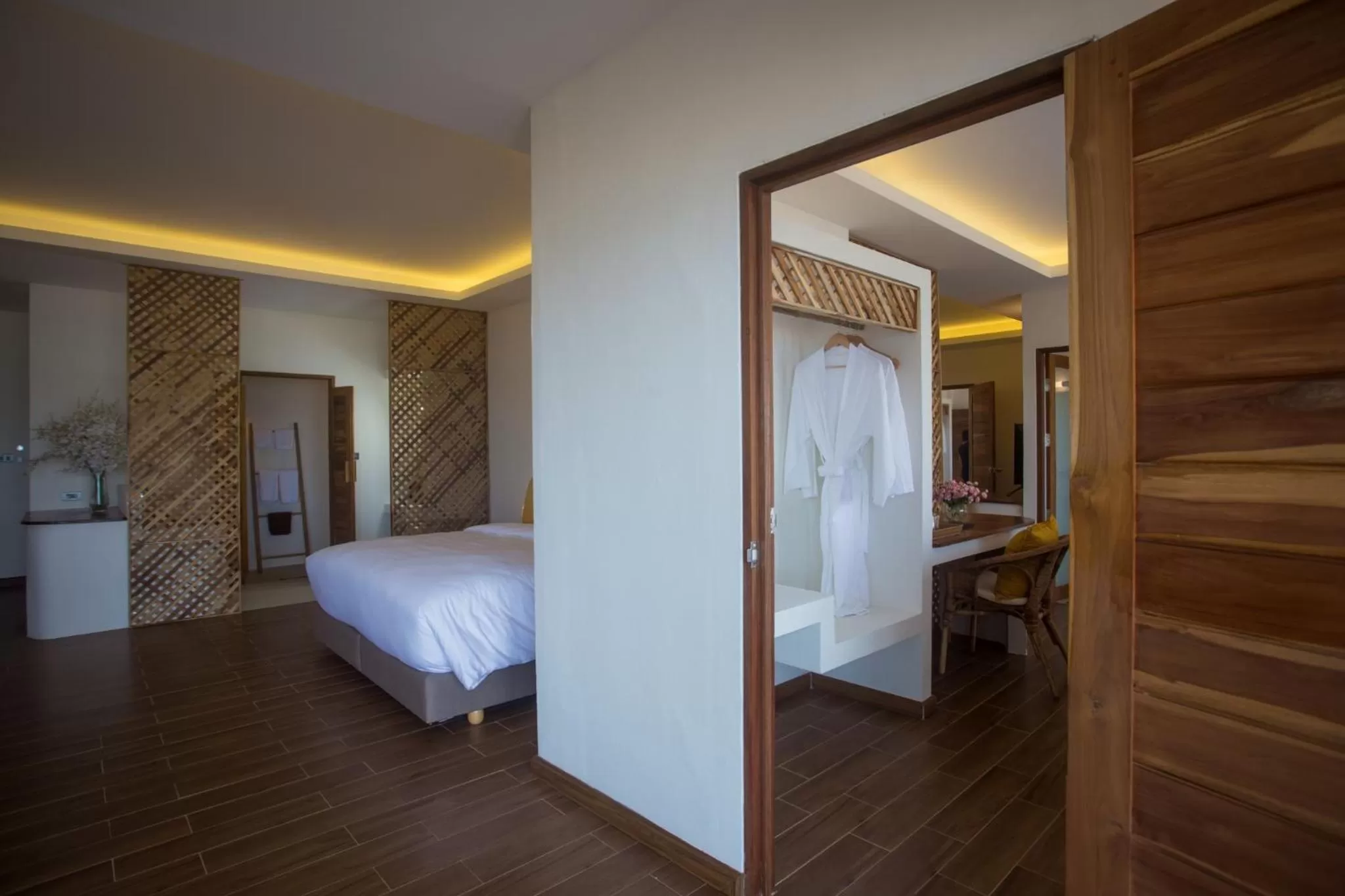 Bed in The Nest Private Beach Resort