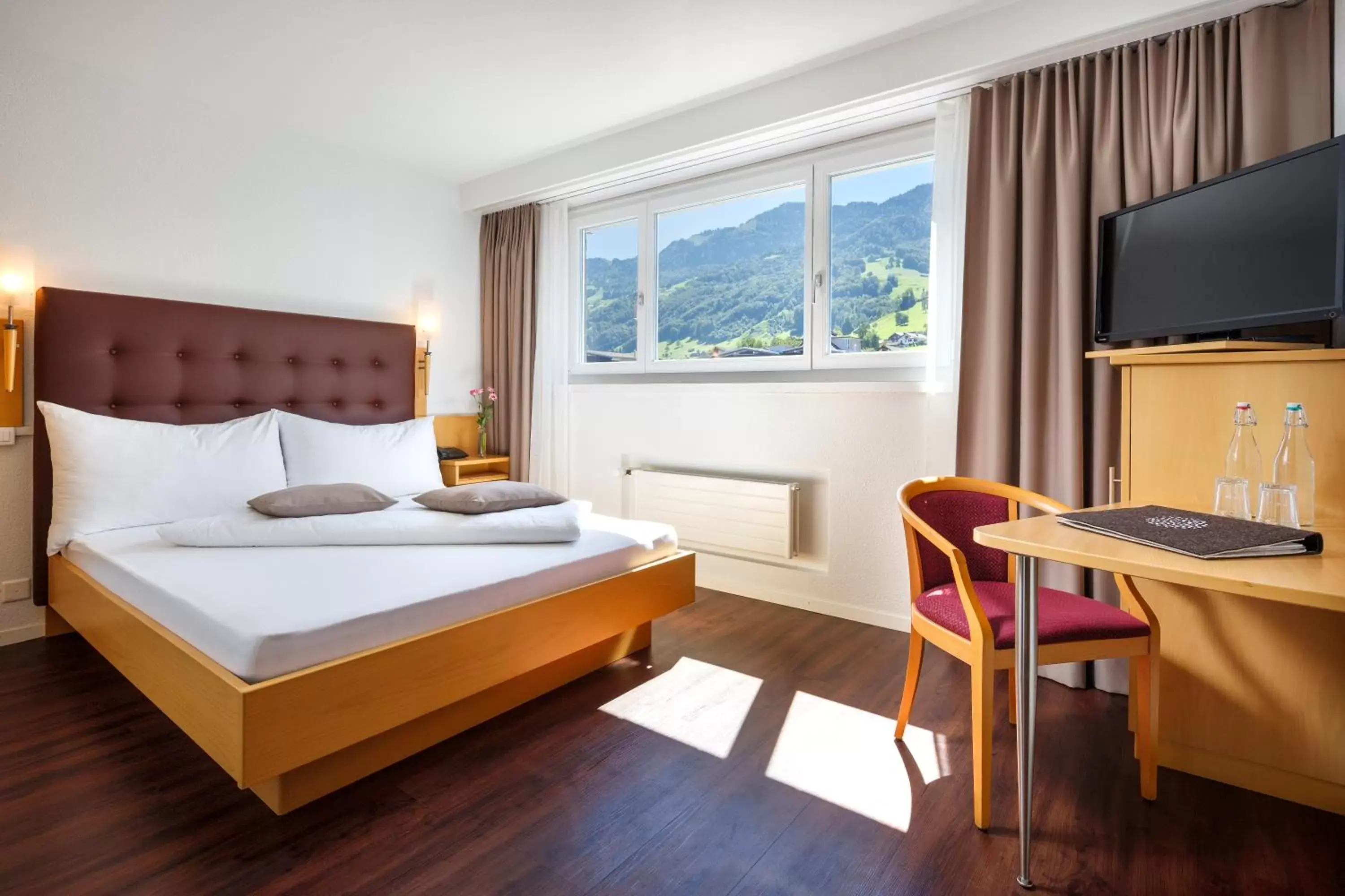 Photo of the whole room, Bed in Seerausch Swiss Quality Hotel