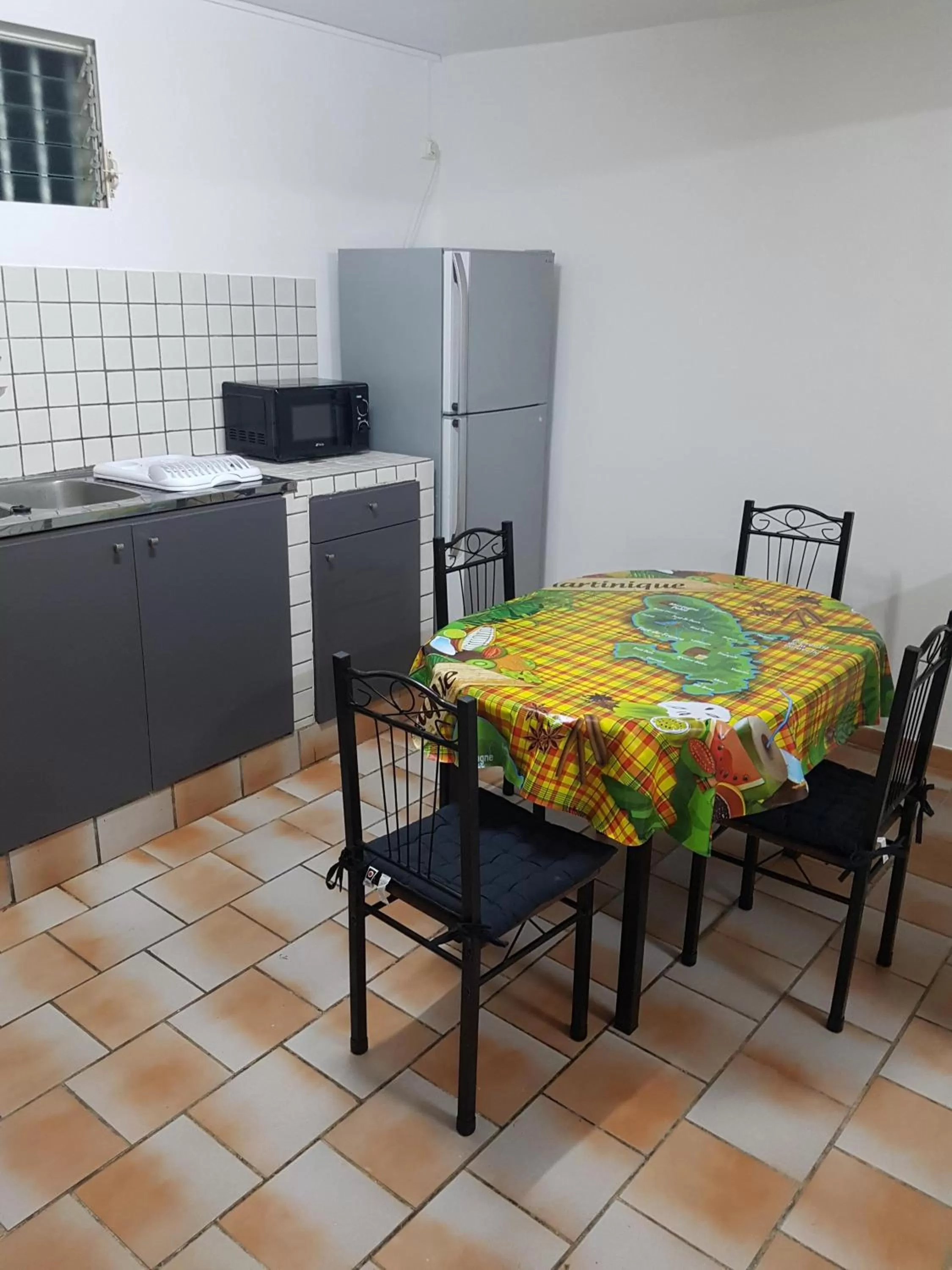 Kitchen or kitchenette in Appartement de la Baie