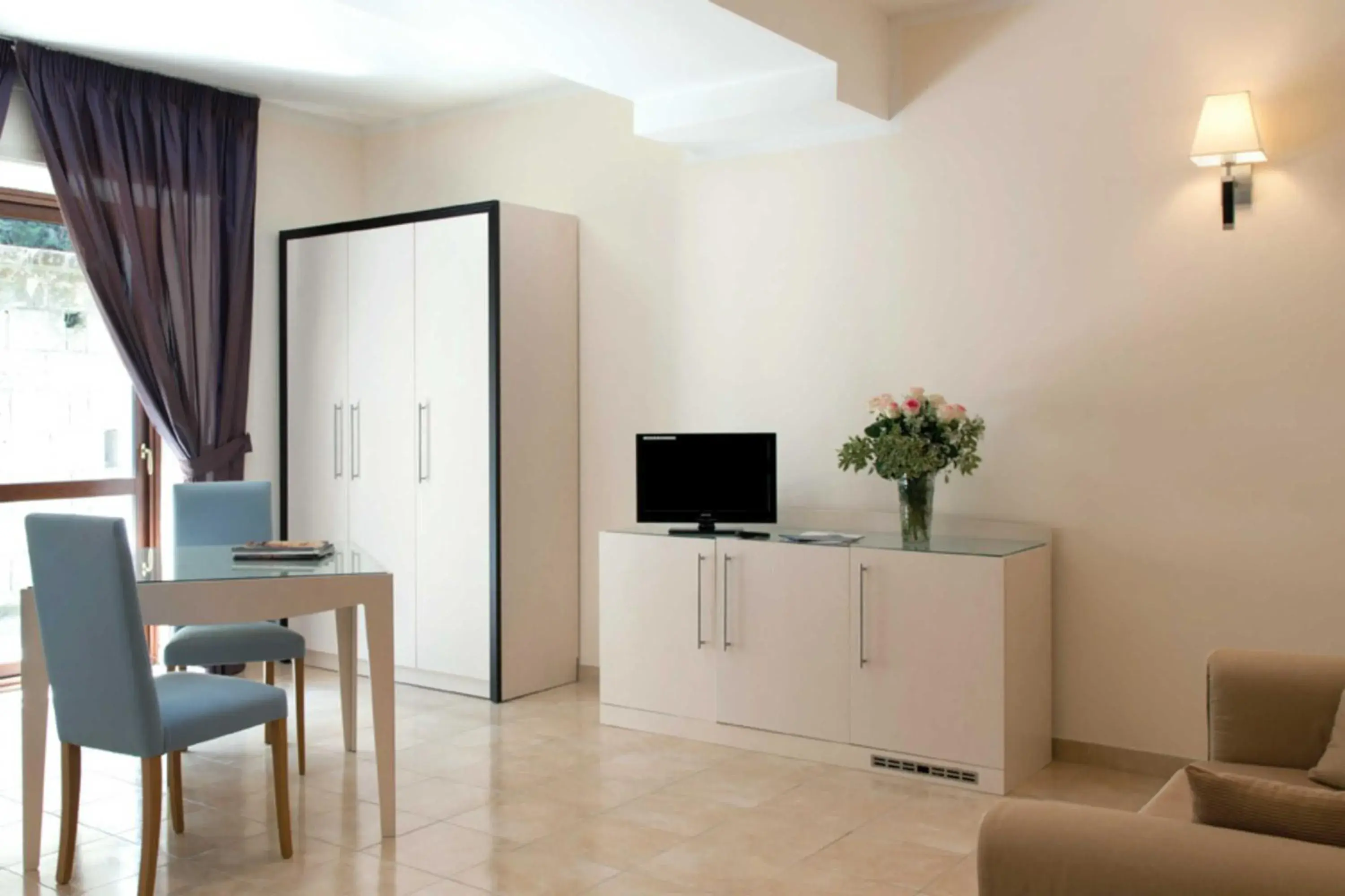 Living room in Suites & Residence Hotel Living room in Suites & Residence Hotel