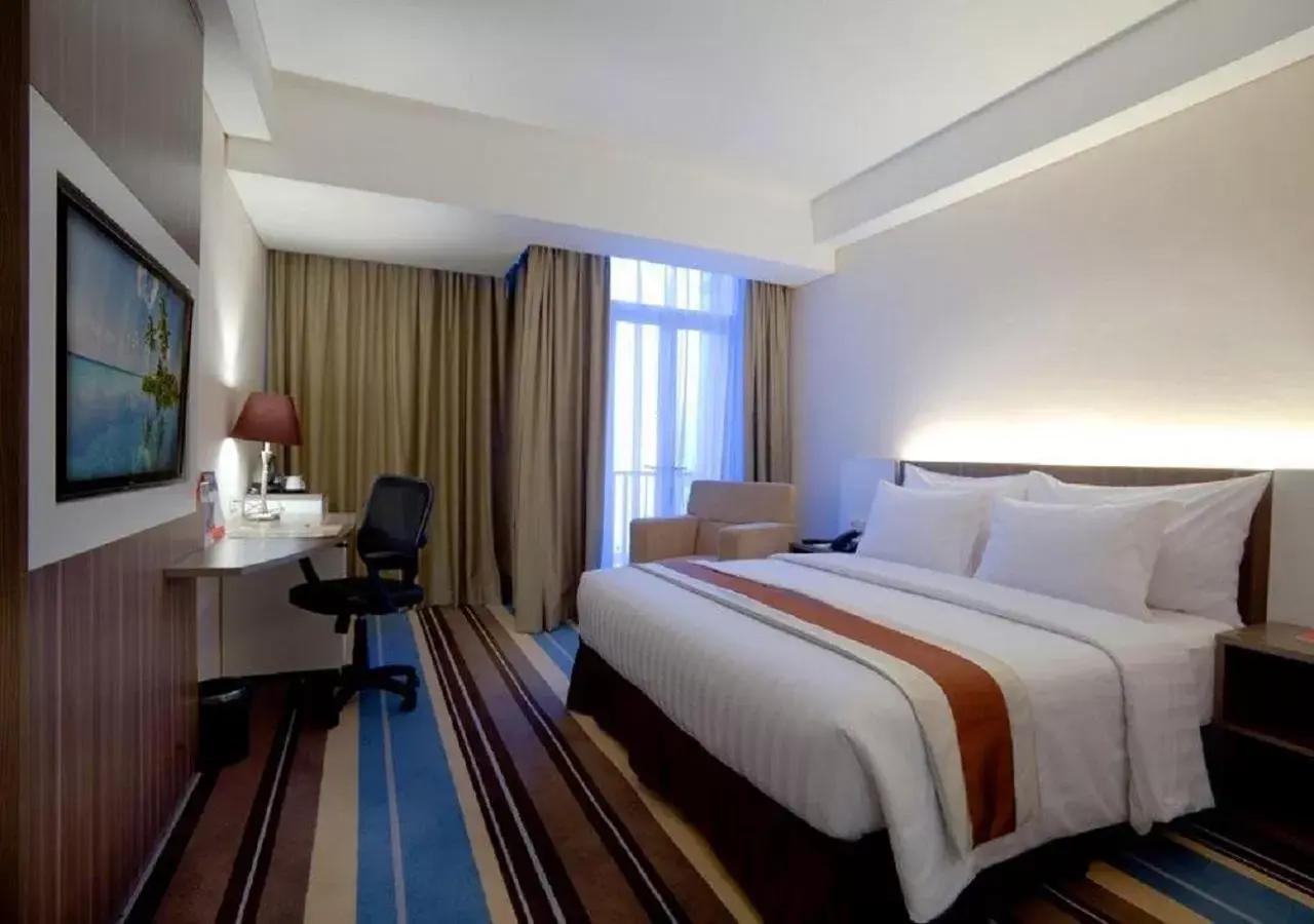 Deluxe Double Room in Swiss-Belhotel Makassar Deluxe Double Room in Swiss-Belhotel Makassar