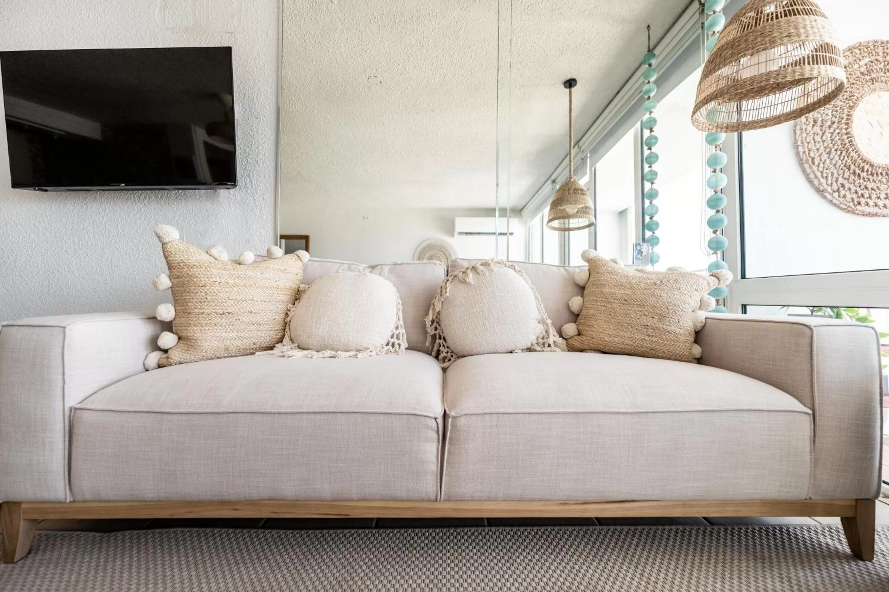 Living room in OCEAN VIEW DELUXE SUITE: PVT. BEACH & POOL