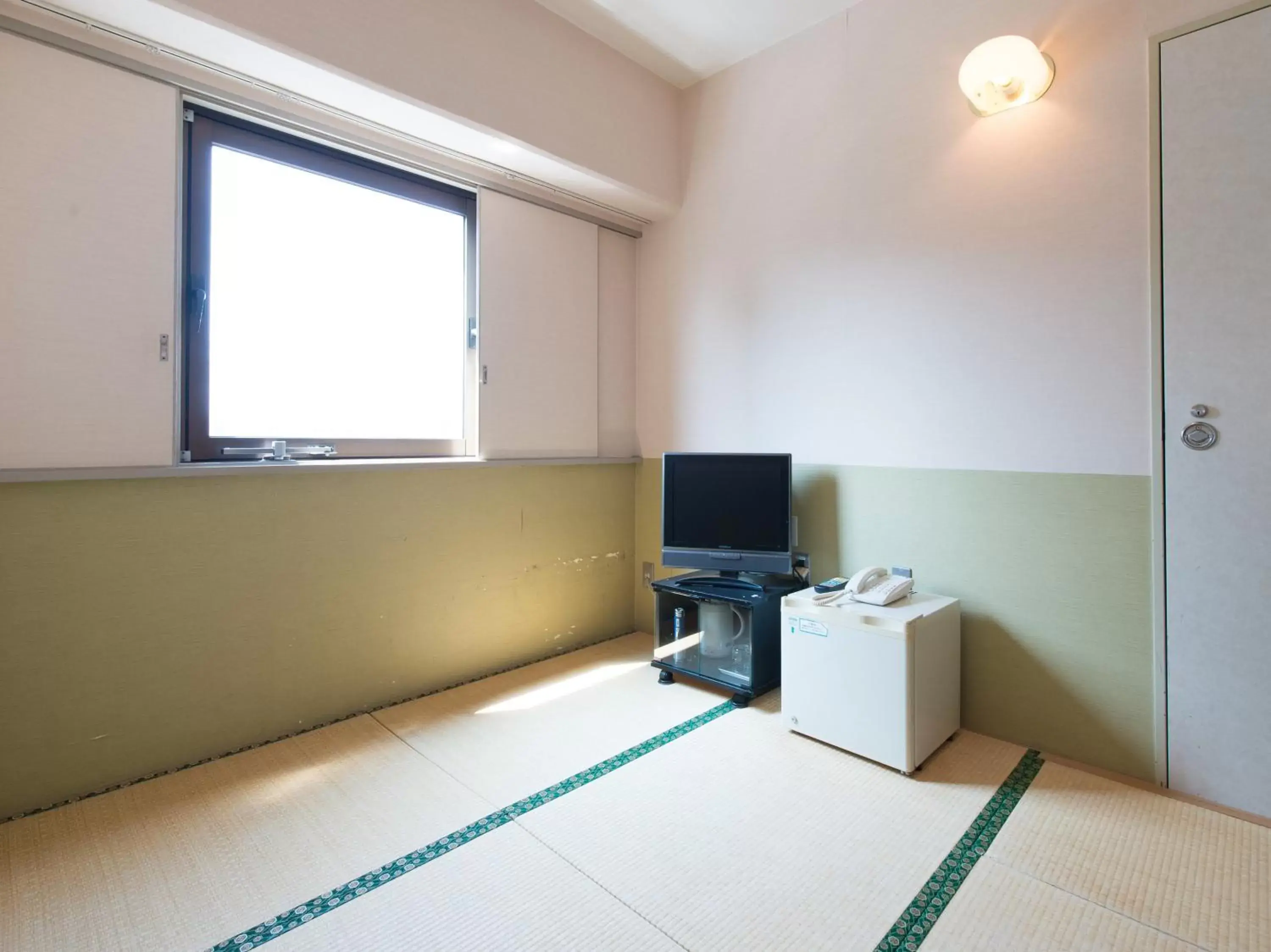 Photo of the whole room, TV/Entertainment Center in Tabist Hotel Tetora Kitakyushu