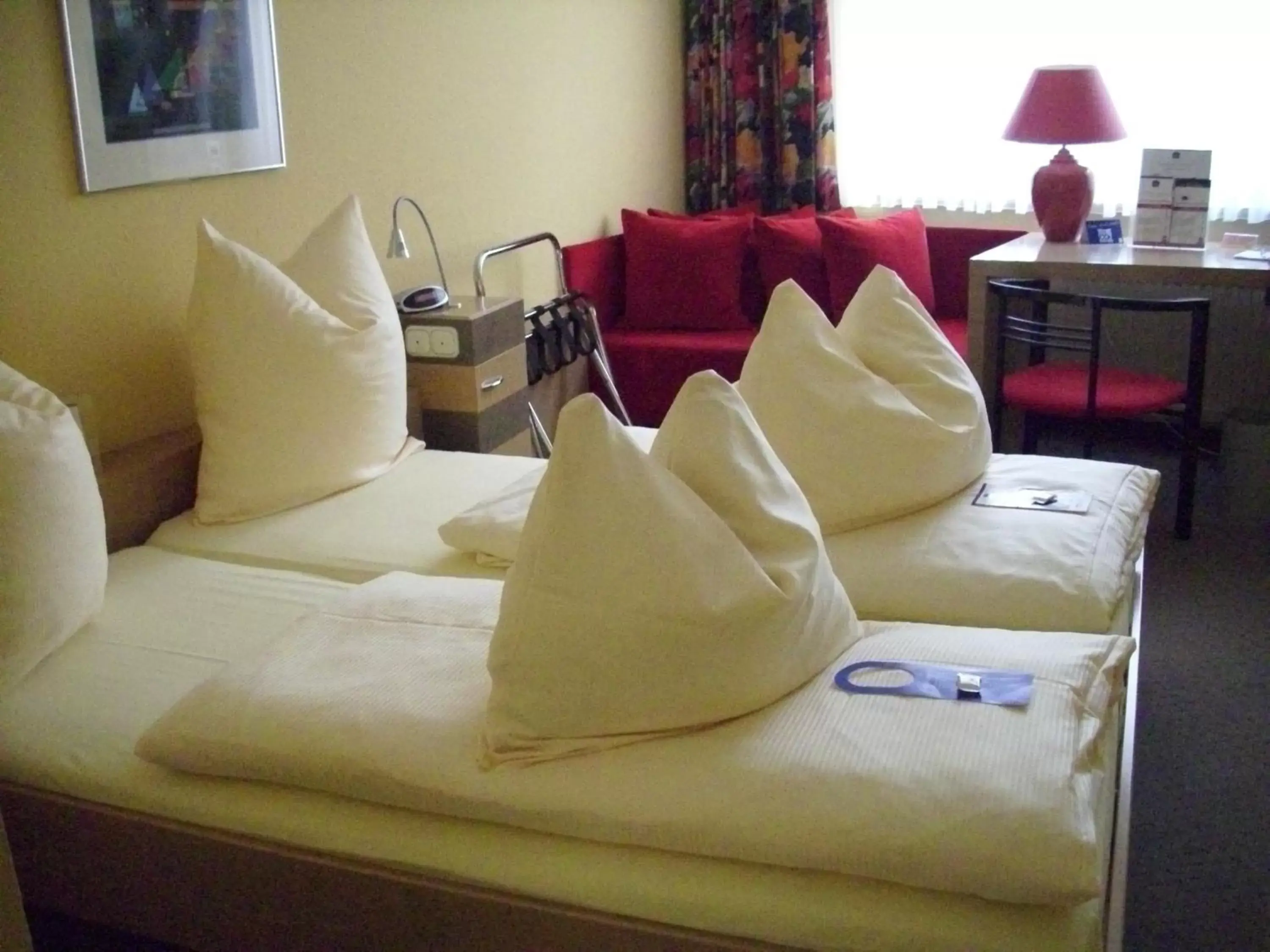Bed in ACHAT Hotel Lüneburger Heide