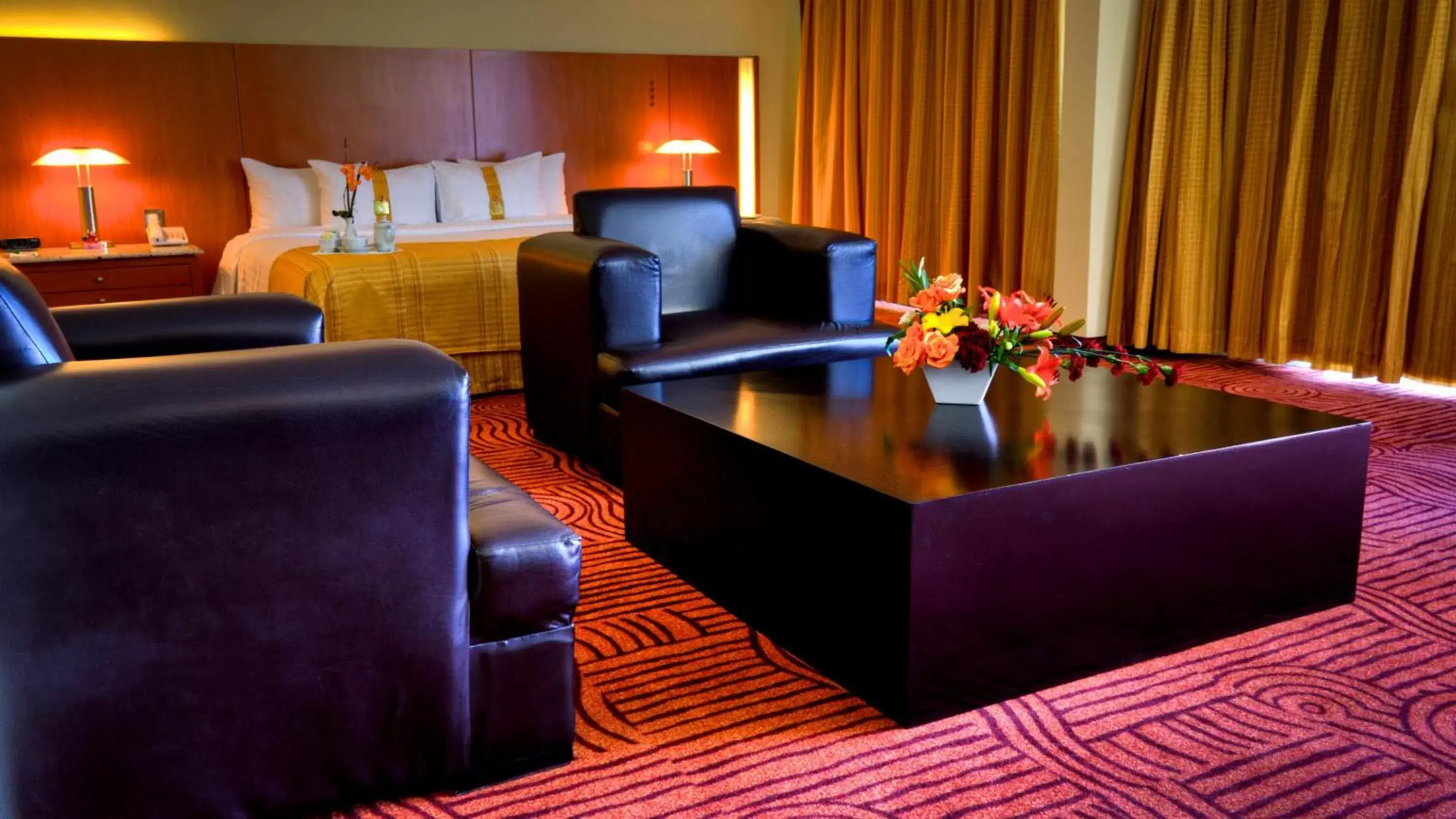 Photo of the whole room, Seating Area in Holiday Inn Puebla Finsa, an IHG Hotel