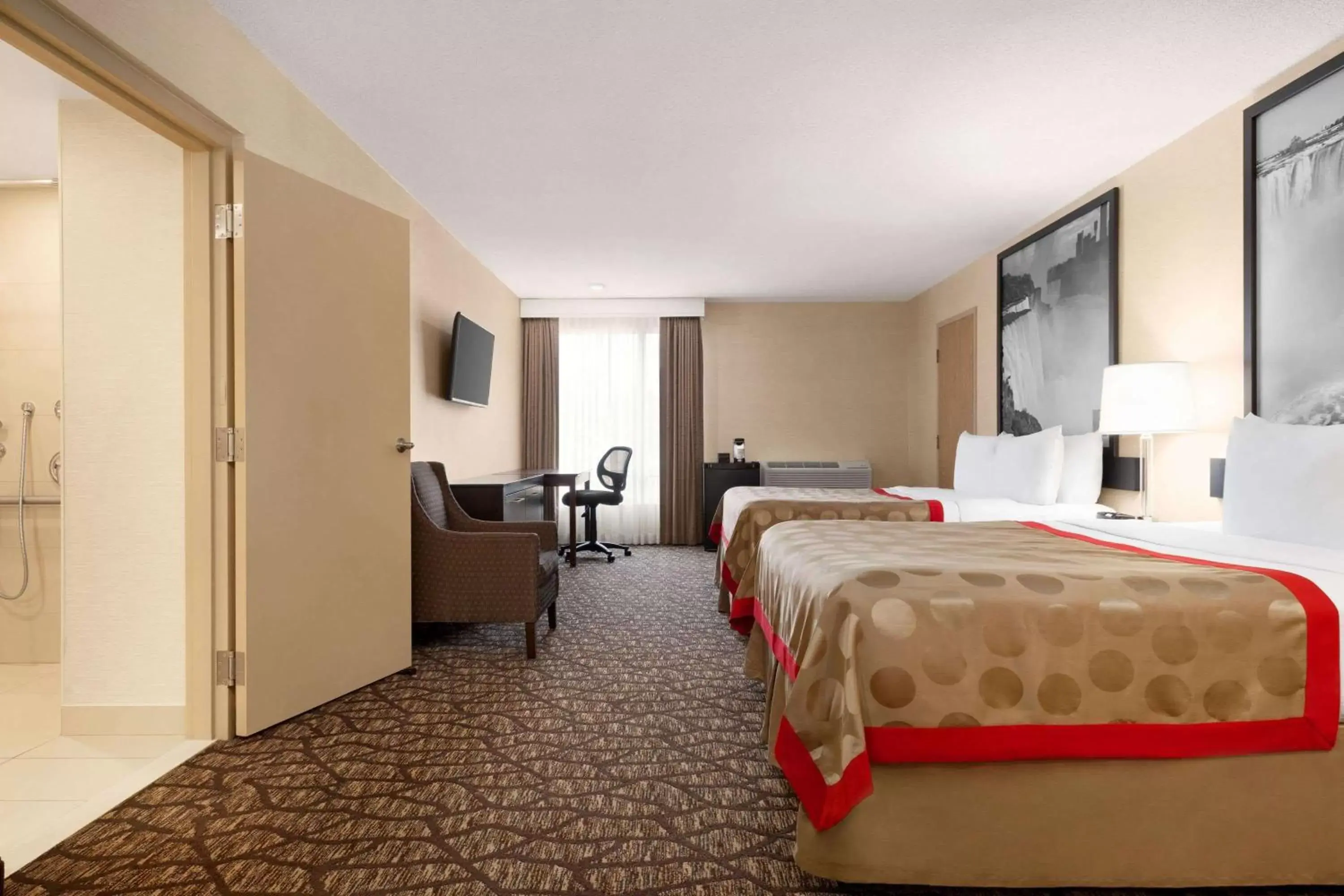 Photo of the whole room, Bed in Ramada By Wyndham Niagara Falls near the Falls