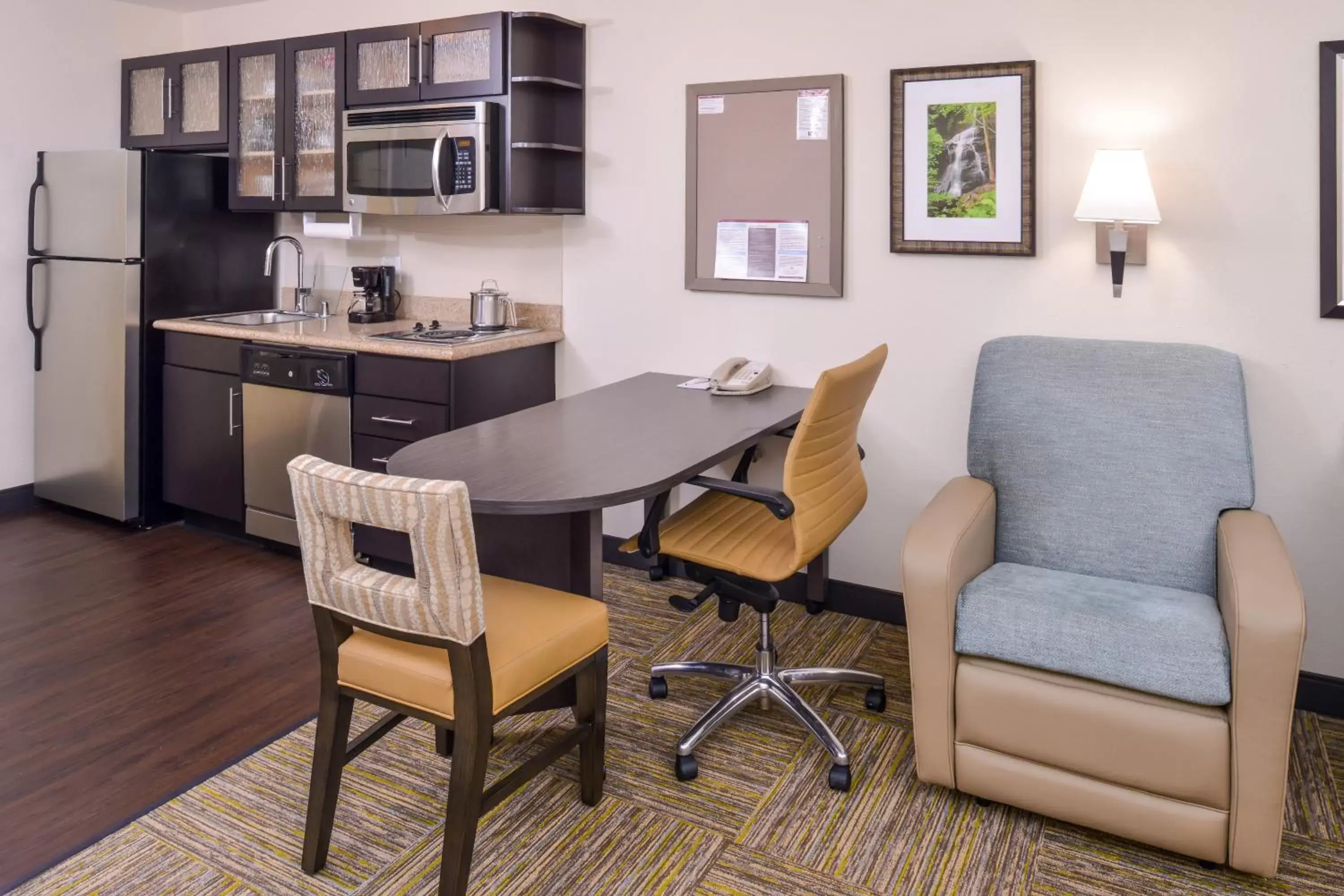 Living room, Dining Area in Candlewood Suites Paducah, an IHG Hotel