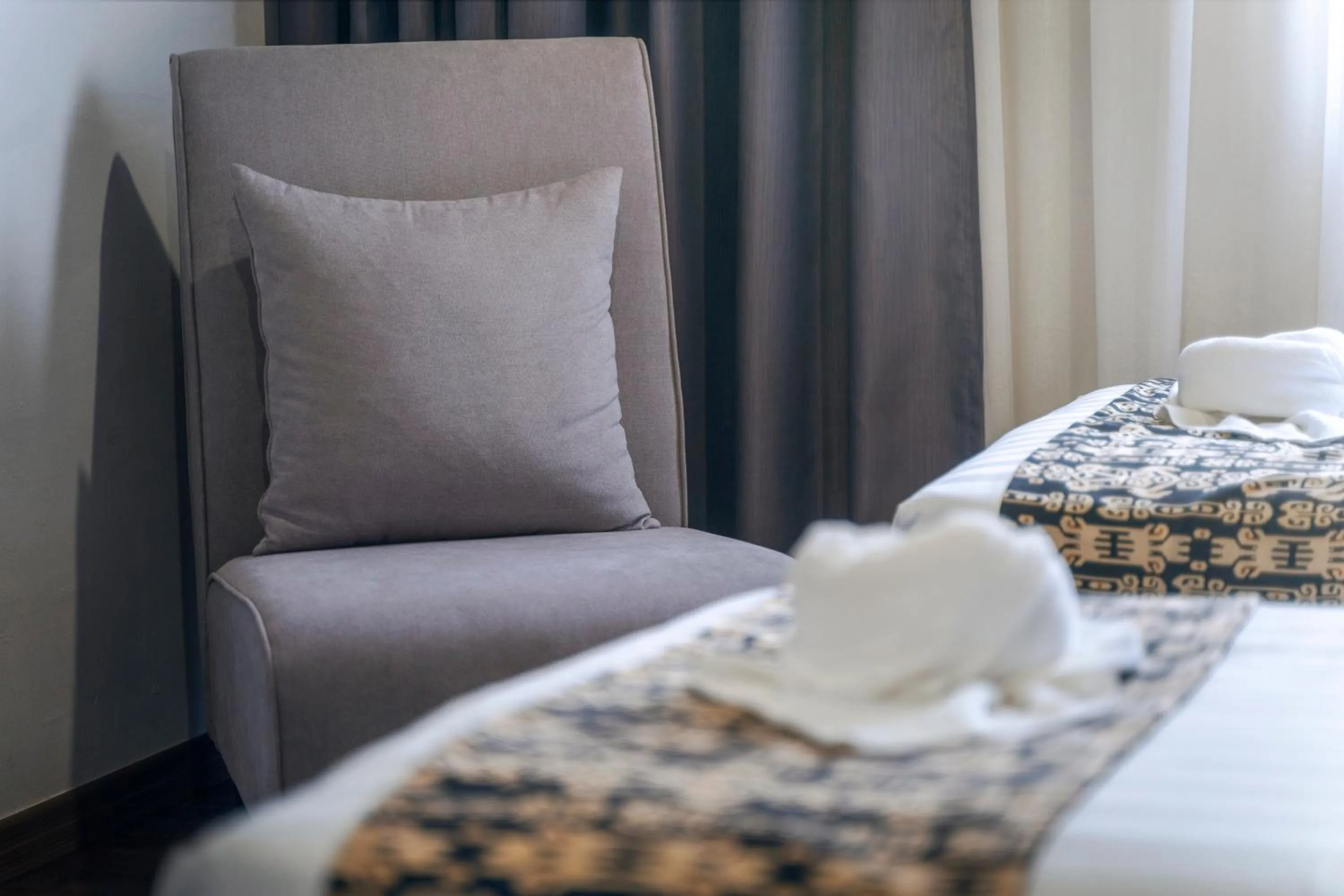 Seating area, Bed in East Riverine Boutique Hotel