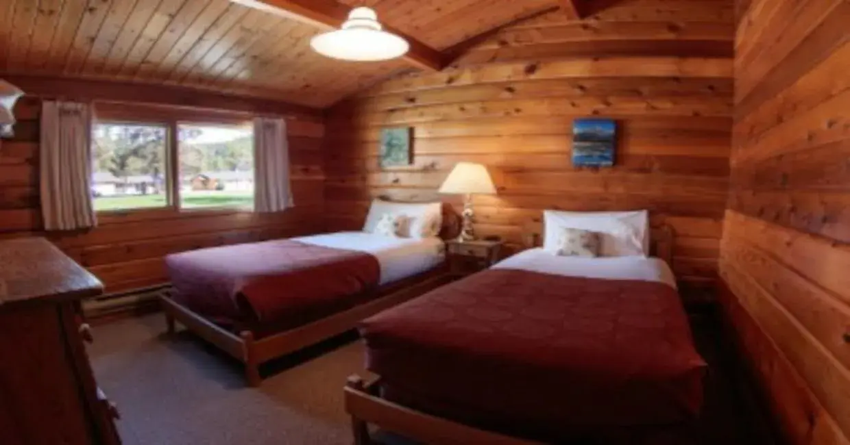 Bed in Jasper House Bungalows