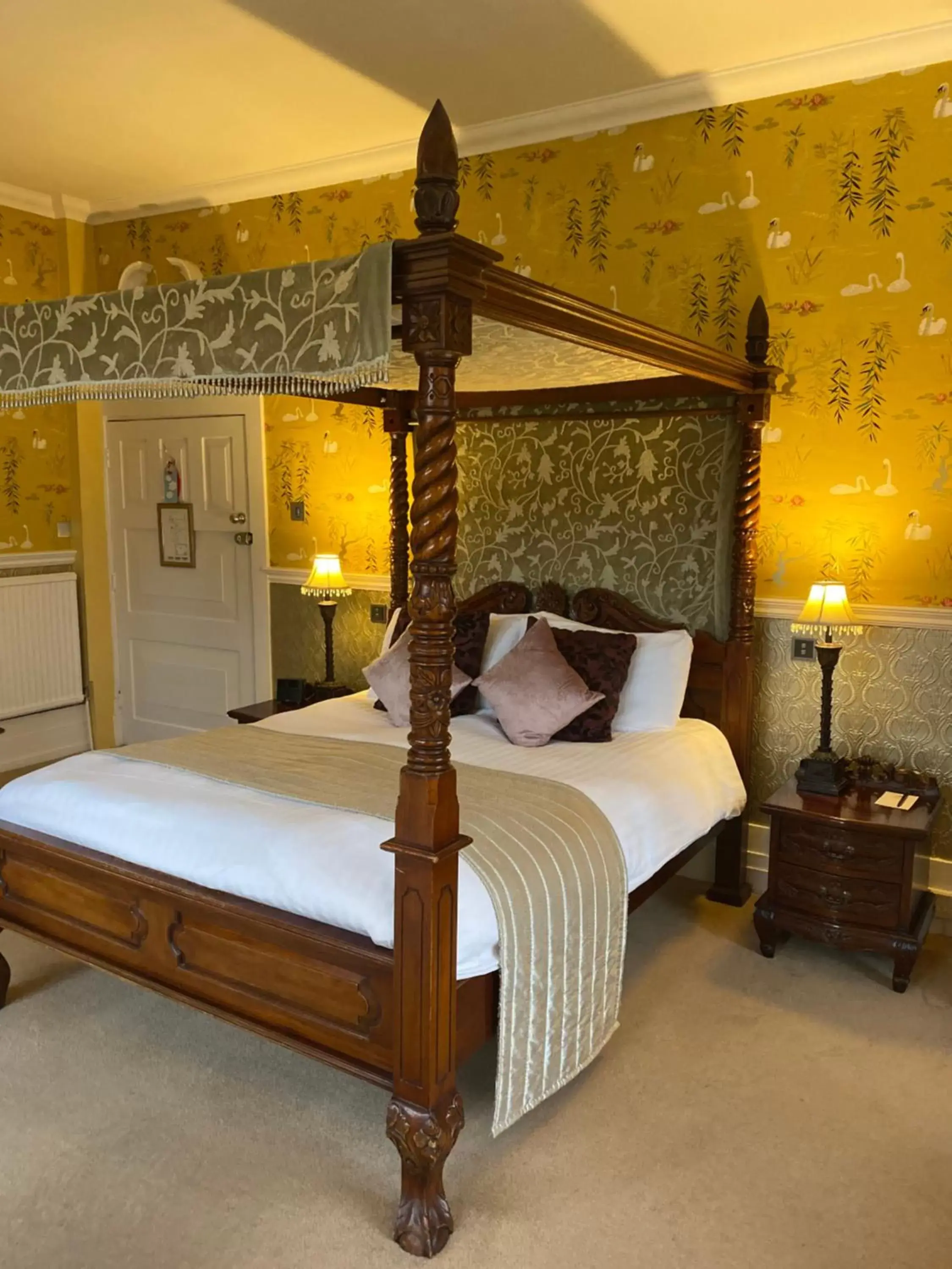 Bed in Langtry Manor Hotel