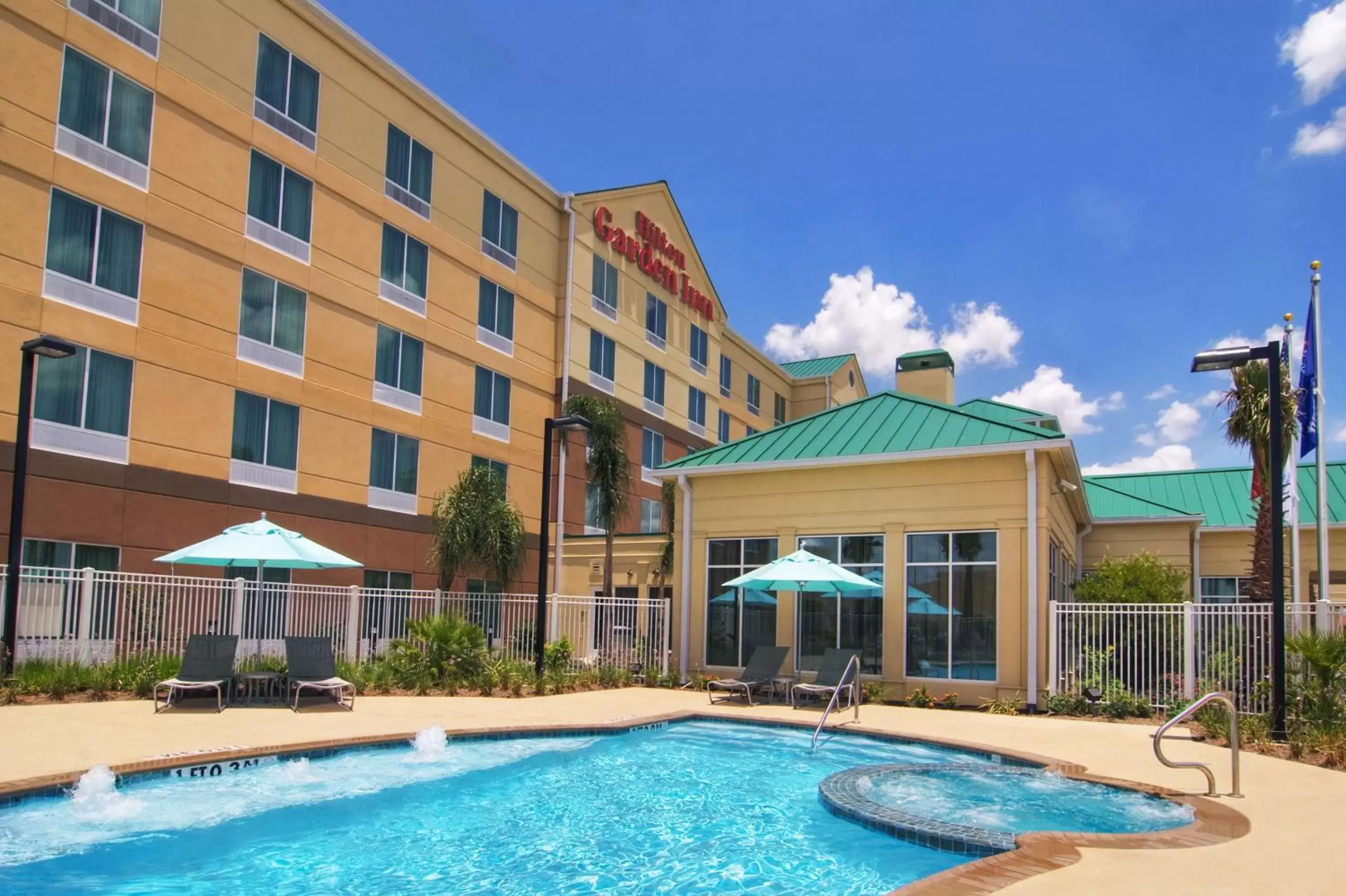 Pool view, Property Building in Hilton Garden Inn Houston-Pearland