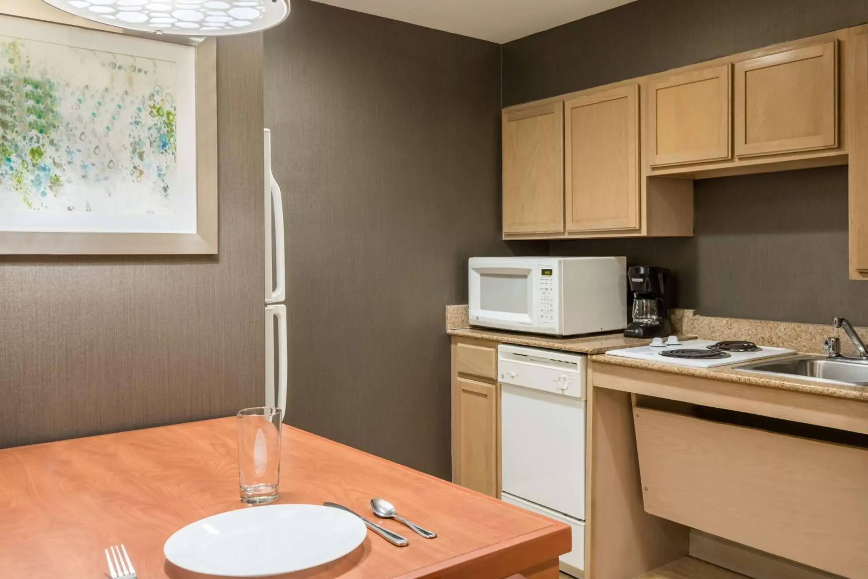 Kitchen or kitchenette, Kitchen/Kitchenette in Homewood Suites by Hilton Orlando-Nearest to Universal Studios