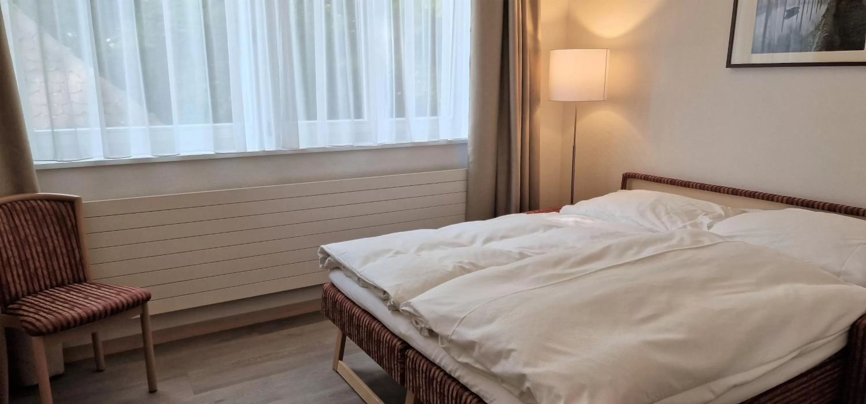 Bed in Hotel Promenade