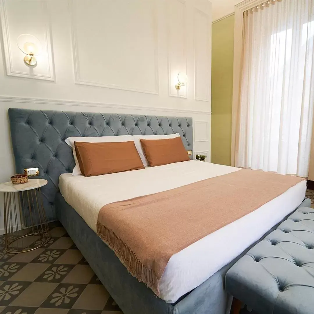 Bed in Toscano Palace Luxury Rooms Catania