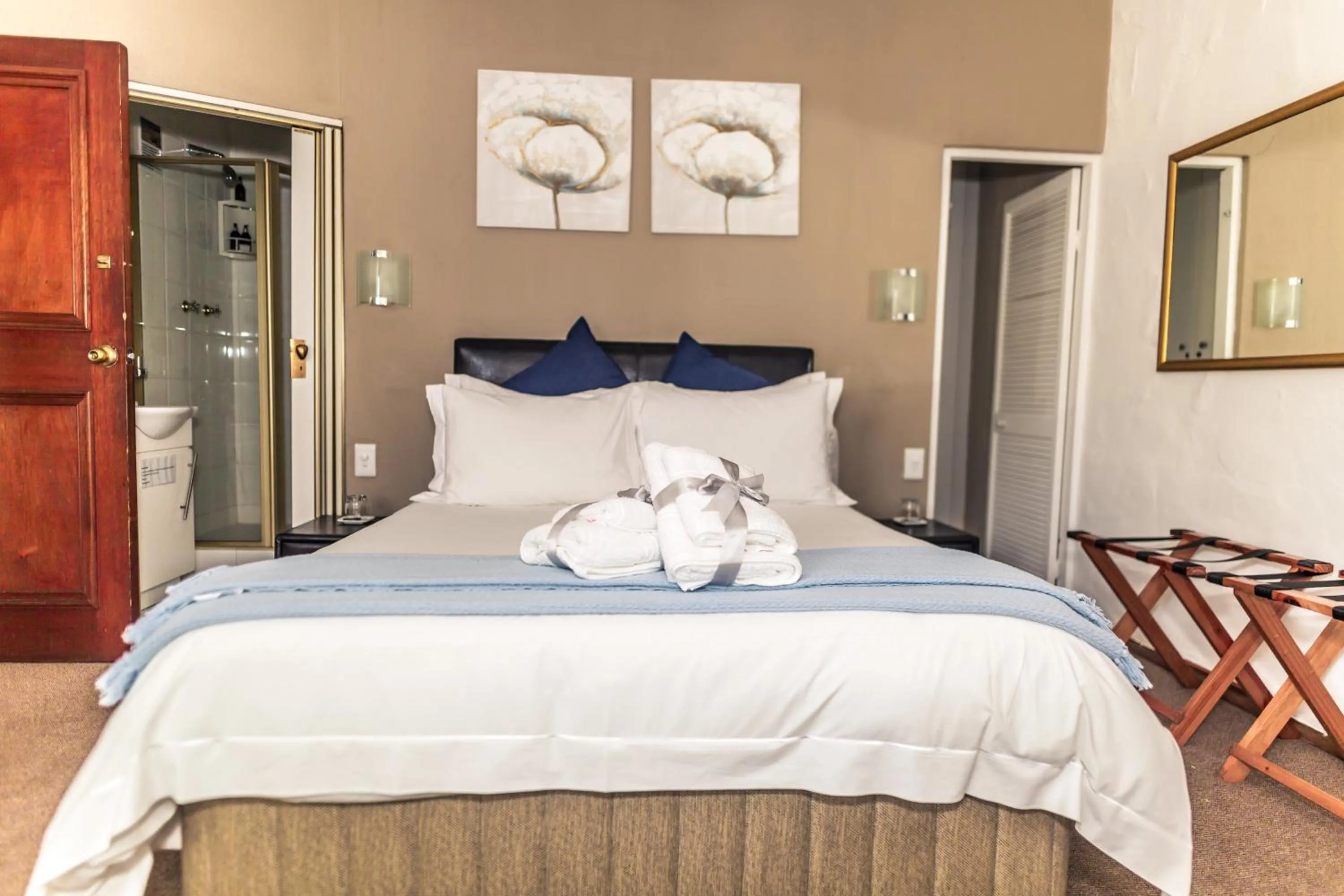 Bed in Point B Guest House -Sustainable Solar Energy