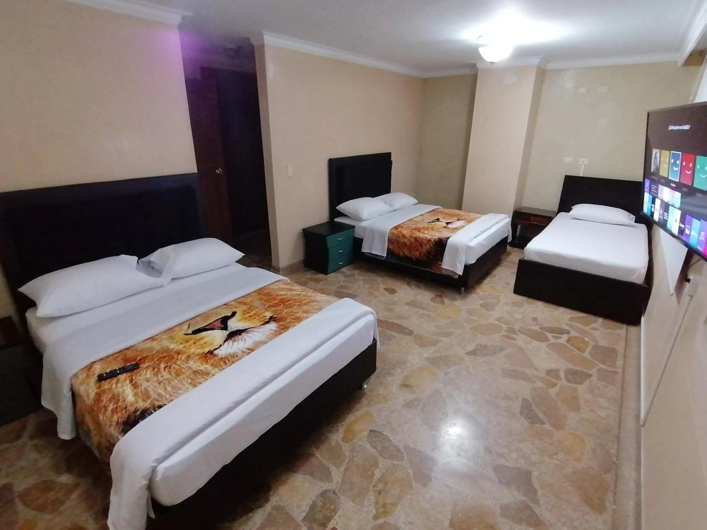 Bed in HOTEL GOLDEN SUITE