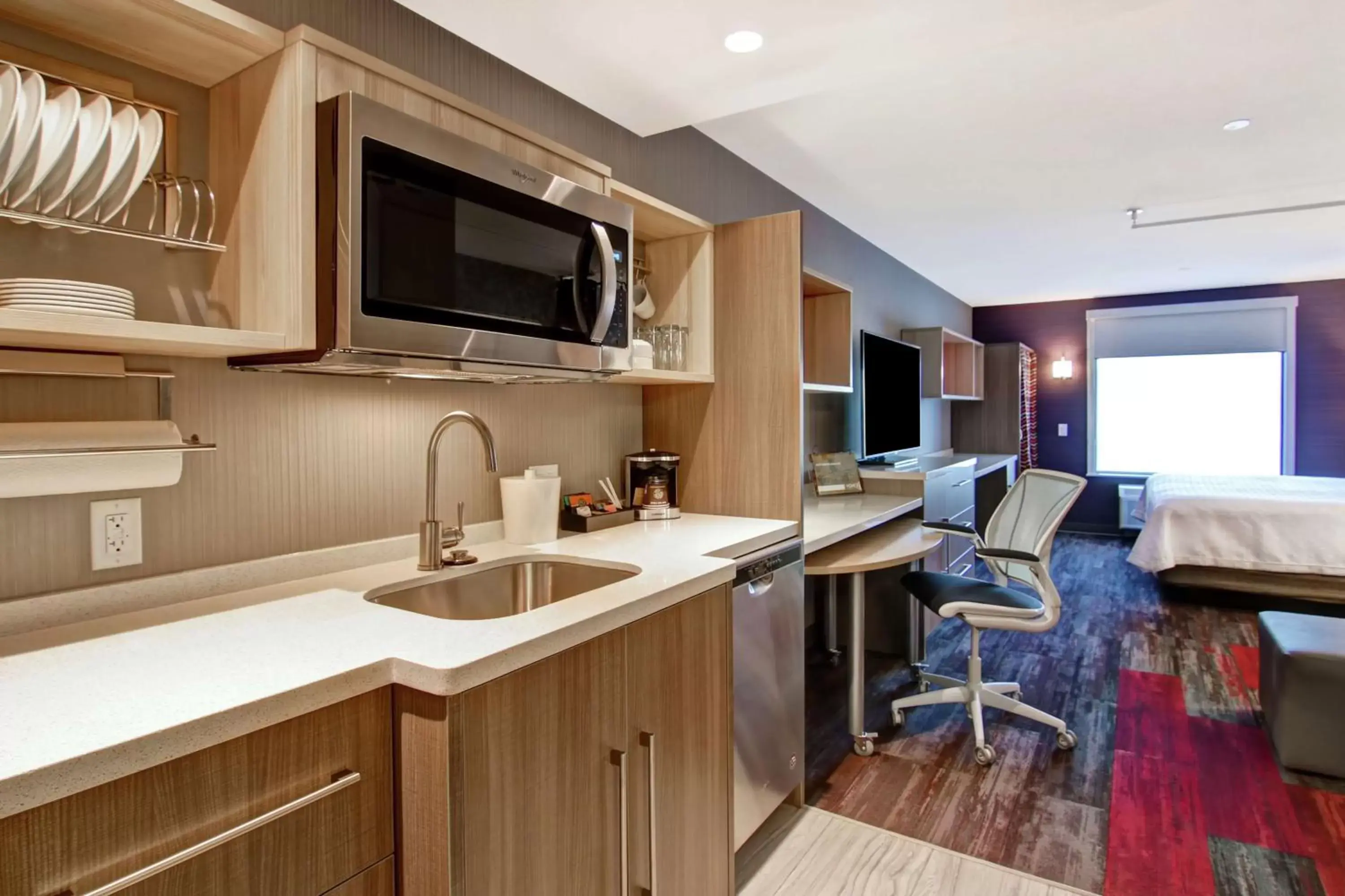 Bedroom, Kitchen/Kitchenette in Home2 Suites By Hilton Edmonton South